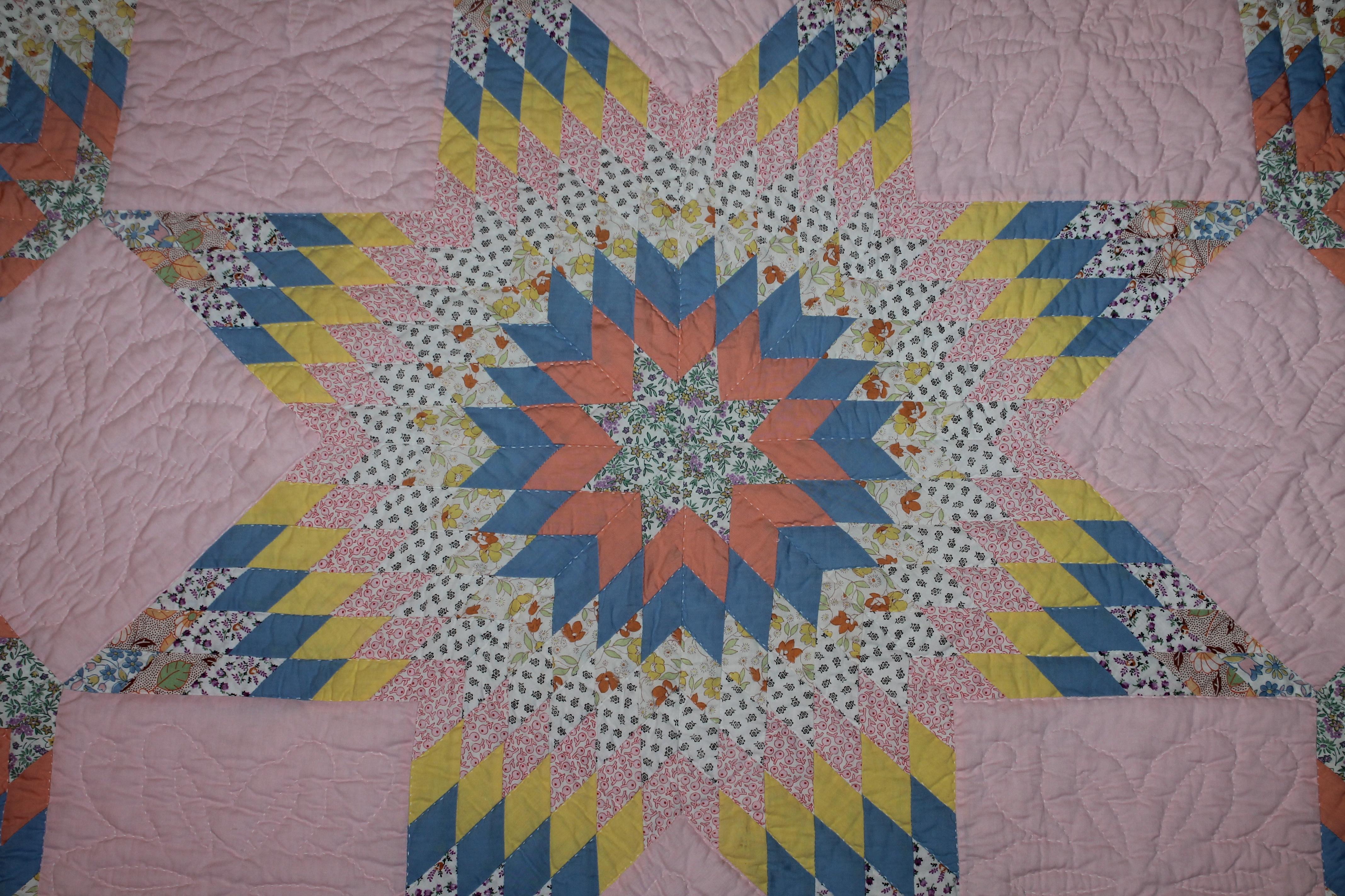 This fine mini piece work broken star quilt has nice quilting and in very good condition.