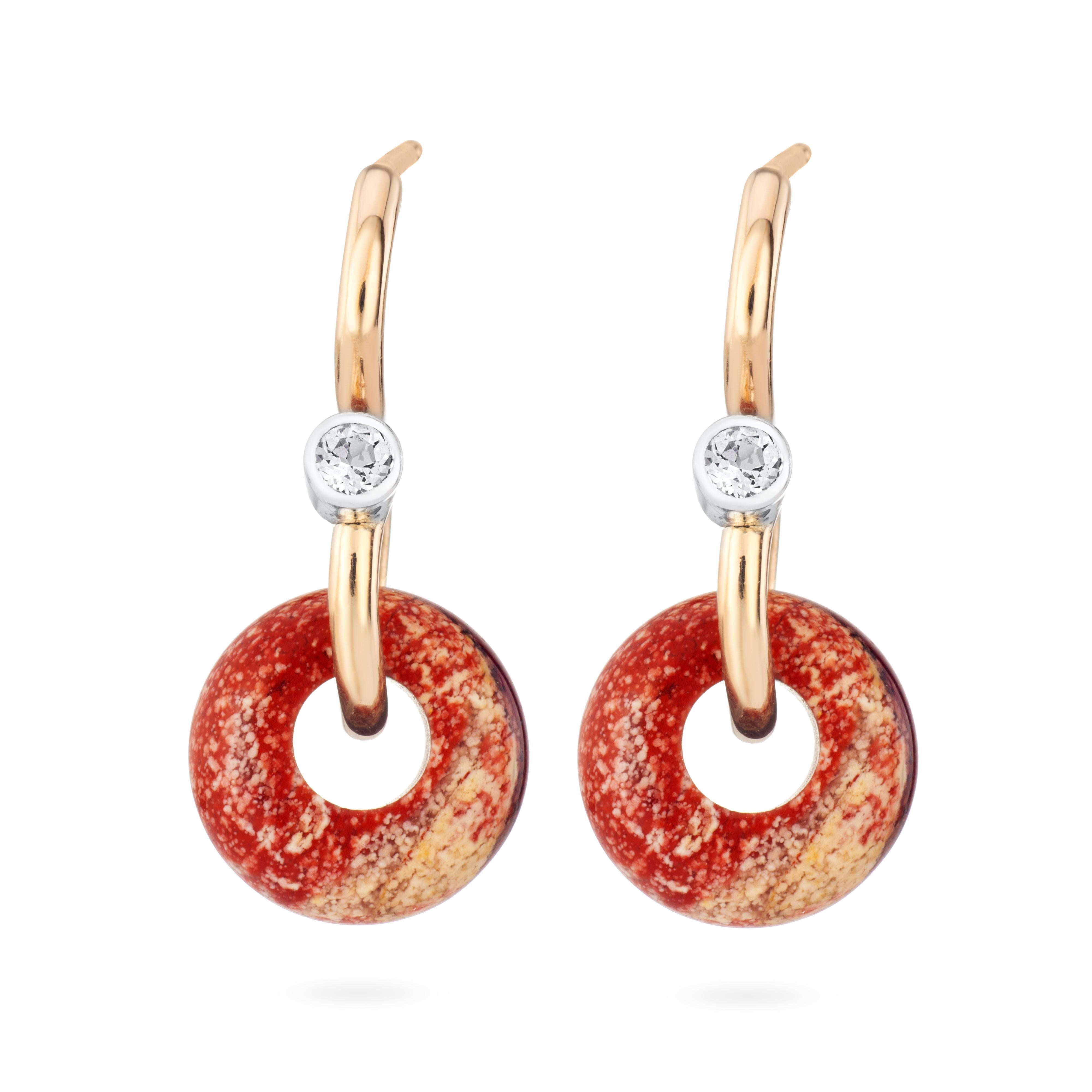 A miniature iteration of the signature poise earrings, an S shaped simple hook design incorporating red jasper and white sapphire gemstones.

Sapphire is known as the stone of wisdom and serenity, whilst red jasper is associated with grounding and