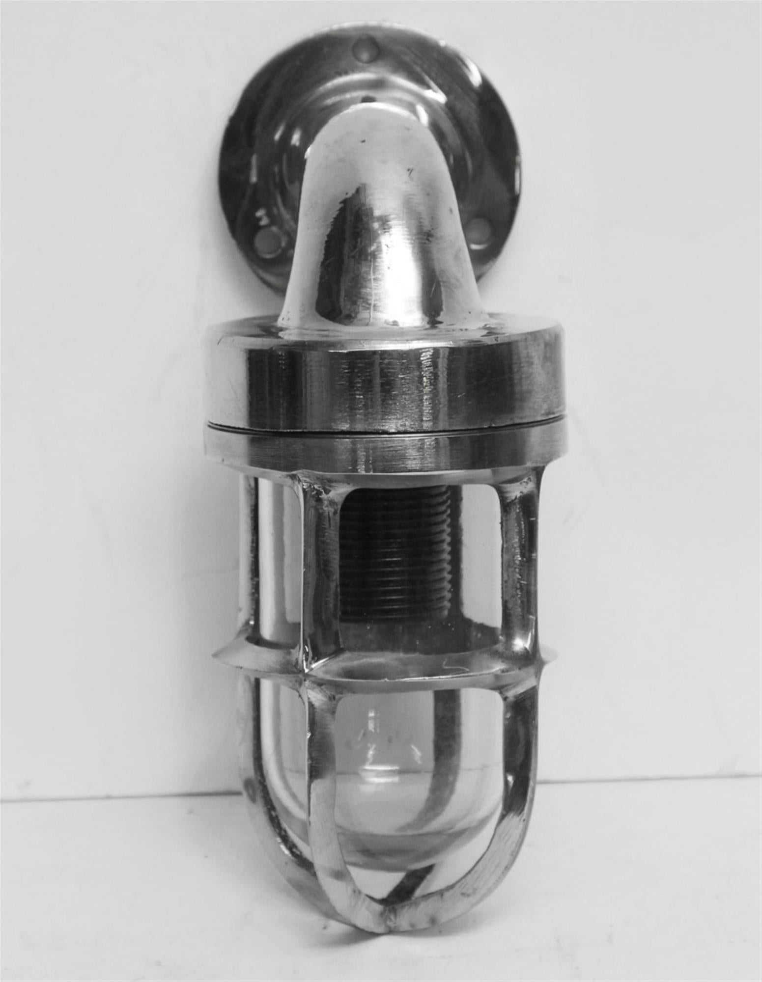 These are mini sconces originally made for ships, now used in commercial and residential applications. They are constructed of aluminium and glass. Quantity available at time of posting. Please inquire. Priced each. This can be seen at our 302