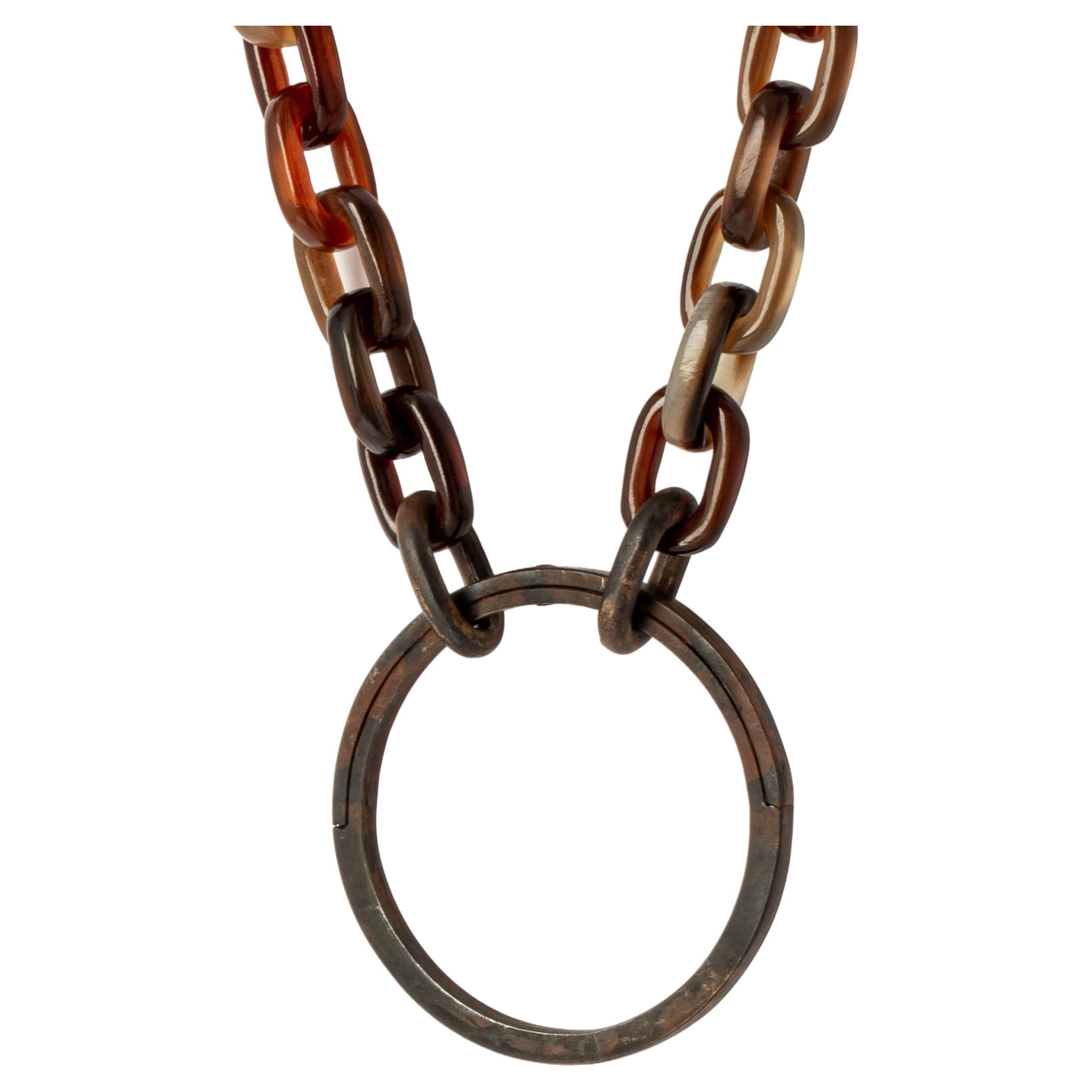 All organic chain is carved by hand. Chains made from horn is modeled and constructed into chain links
The Charm System is an interrelated group of products that can be mixed and matched or worn individually.
Chain length: 900 mm
Portal diameter: 55