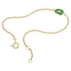 Mini Puzzle  Bracelet in 18k yellow Gold and tsavorites