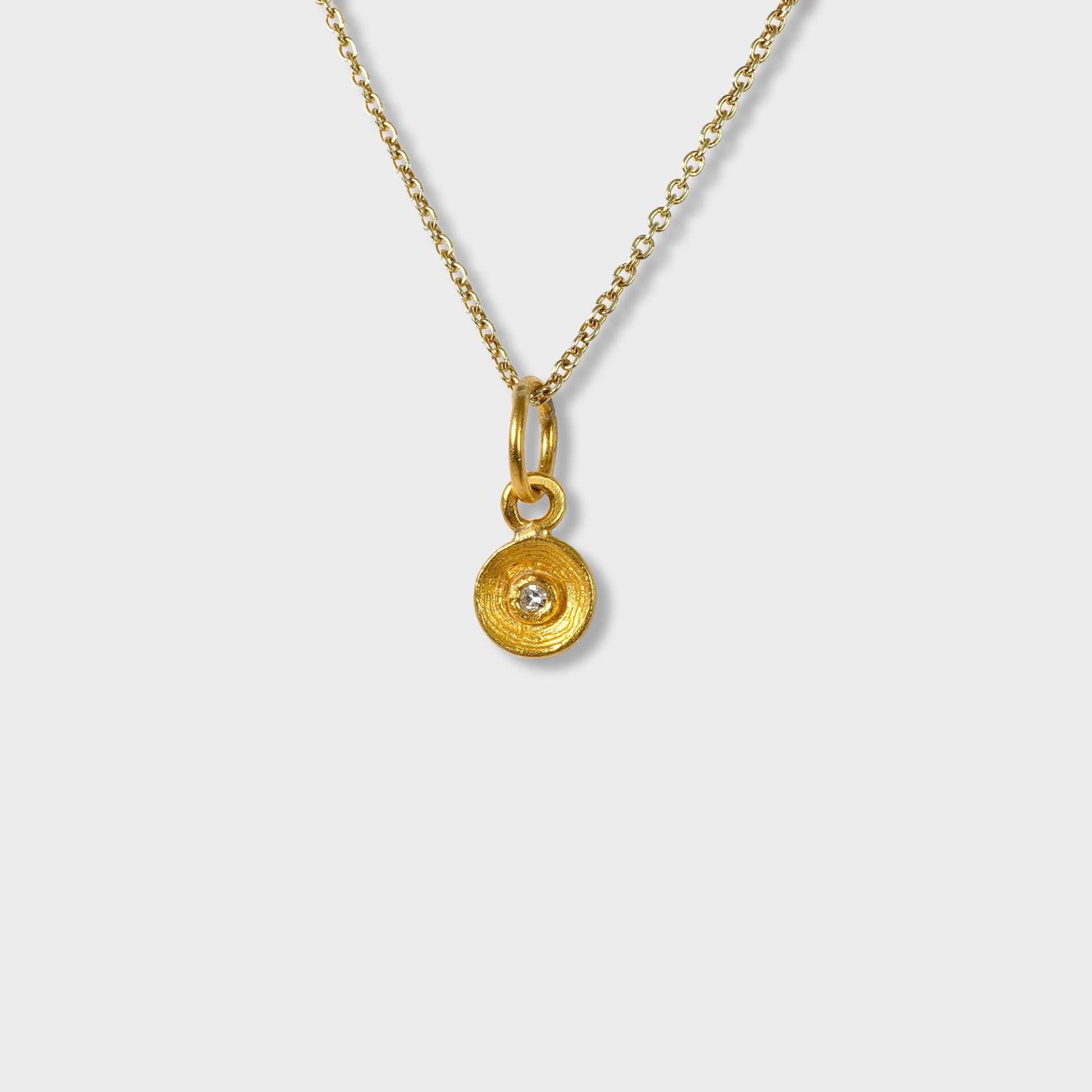 Mini, Rhythm of Life, Charm, Solid 24K Gold and 0.02ct Diamond

Size - Very Small Charm (Looks great paired and layered with other charm pendants)
Approximately 12 mm
1 Diamond - 0.02cts
24K Solid Gold - 0.81 grams

THE STORY

The Rhythm of Life