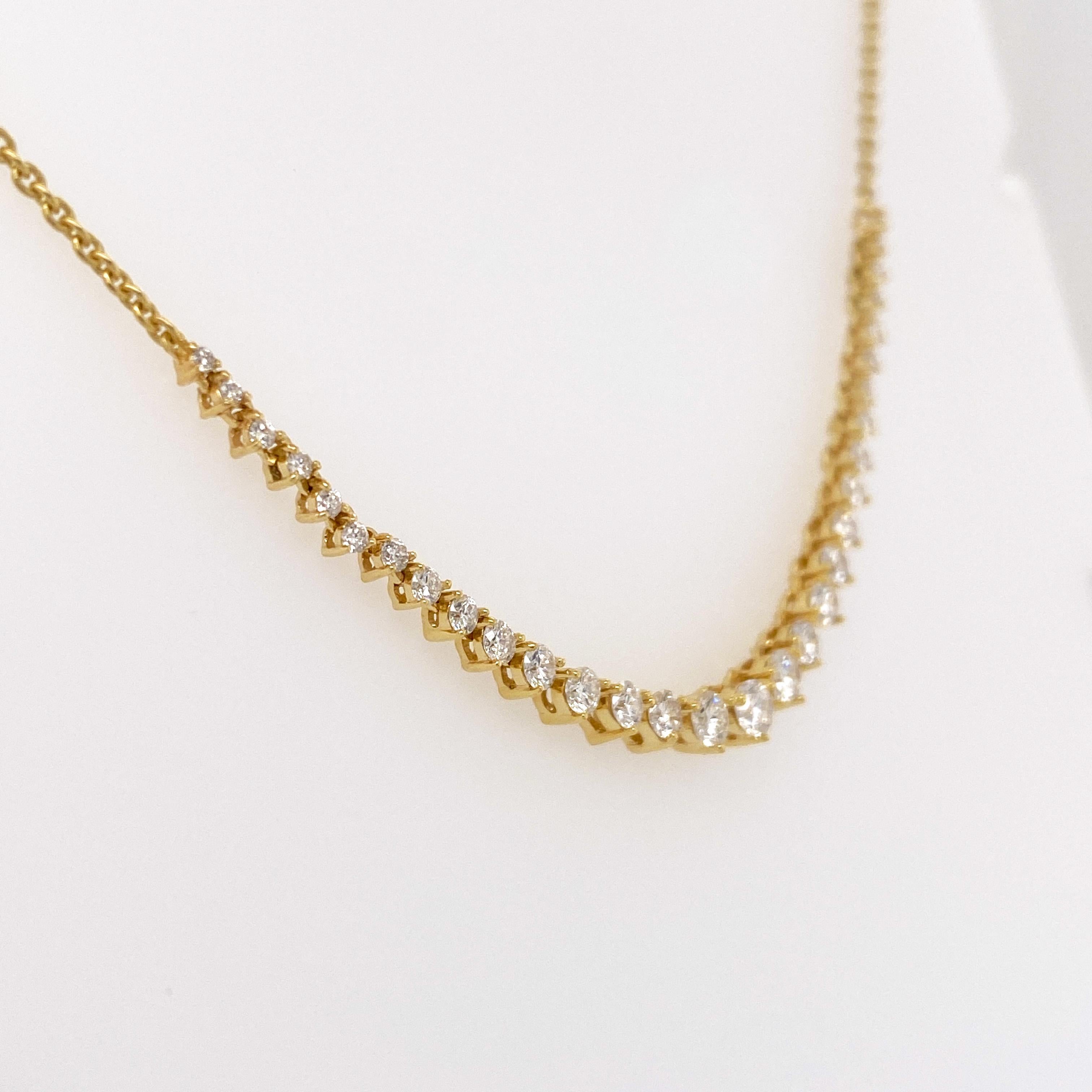 This fantastic diamond Riveria necklace has thirty-one diamonds that are round brilliant cut. The diamond weight is 1.10 carats and VS2 clarity and F/G color. There is a lovely cable chain attached to each end. The necklace is adjustable at 16