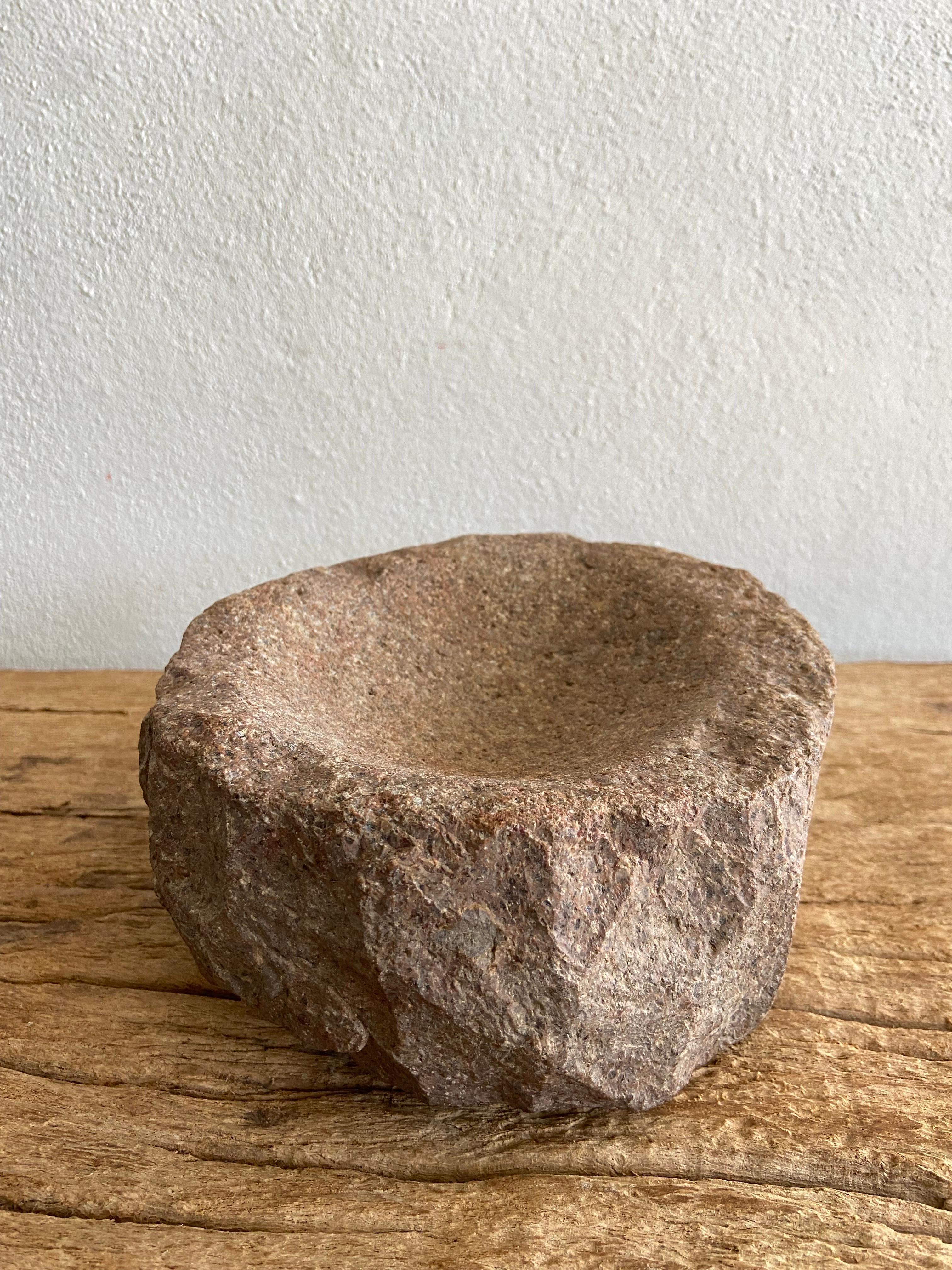 Hand-carved riverstone trough from Central Mexico, circa 1920´s. Slightly larger than an ashtray, the stone used is almost as heavy and dense as granite. Nice rudimentary form.