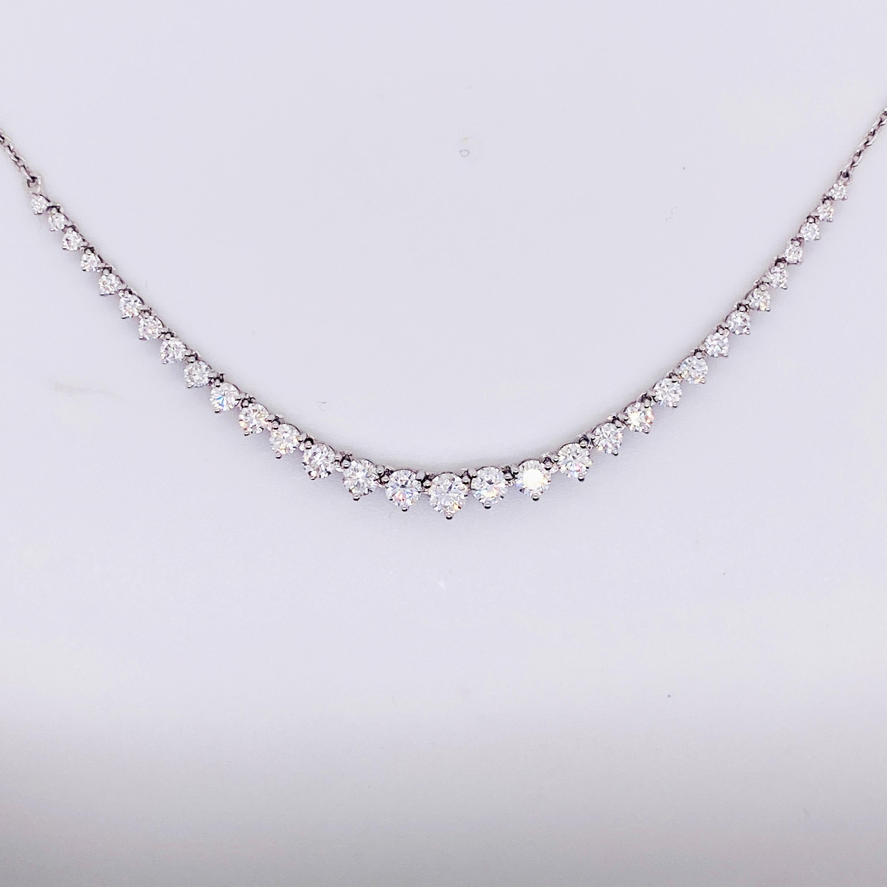 If you are looking for an affordable, high quality Riviera style necklace, this is the piece for you! This beautiful mini-Riviera tennis necklace has graduated diamonds set on point that add grace and flair to your fine jewelry collection! The