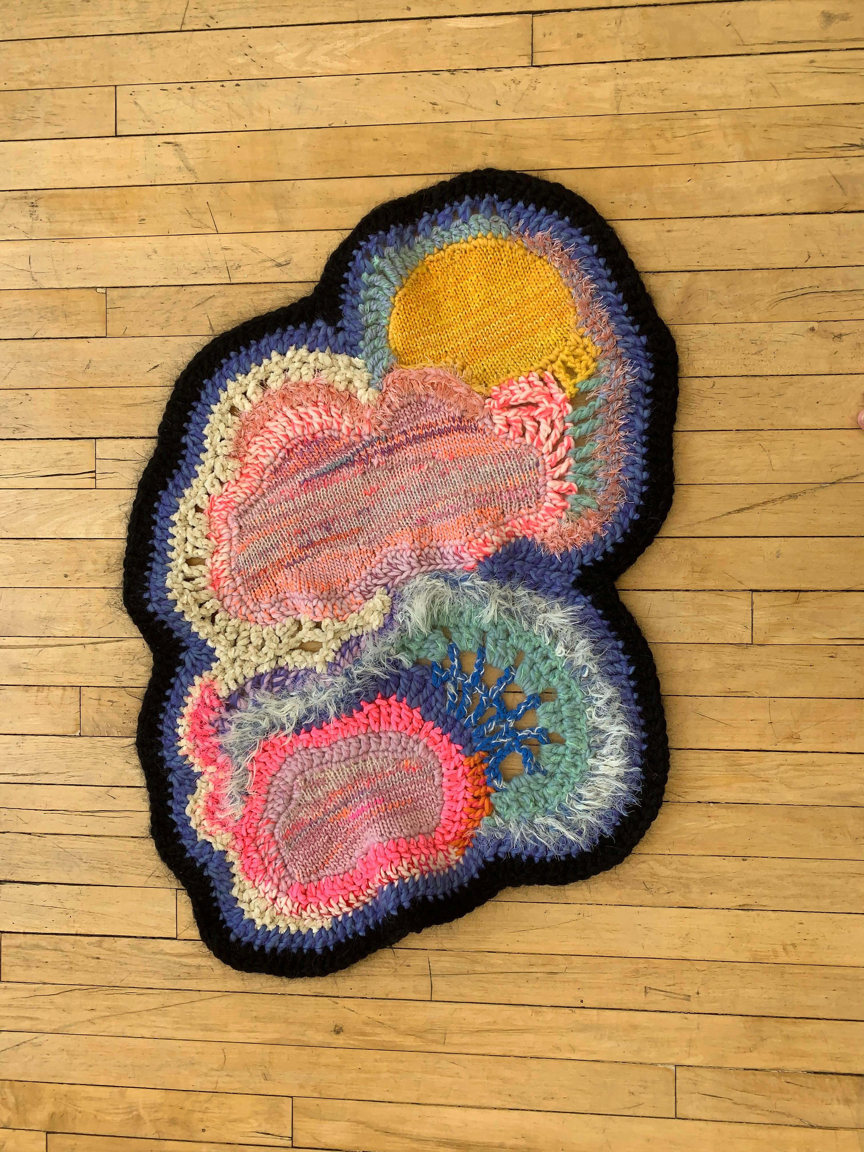This is a handmade, one of a kind, knit and crocheted piece of textile art made by the London collaborative Paris Essex. Founded by Carolyn Clewer and Tiphaine de Lussy, Paris Essex is the result of years of collaboration between the two knitwear