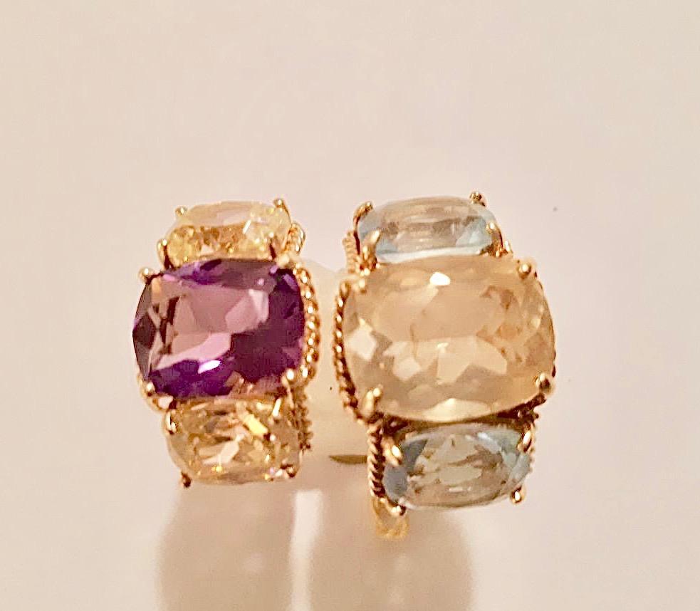 Elegant MINI 18kt Rose Gold Three Stone Ring with Rope Twist Border with split shank detail. The ring features a faceted cushion cut Amethyst Center stone and two Pale cushion cut Pink Topaz side stones stones surrounded by twisted gold rope. 

The