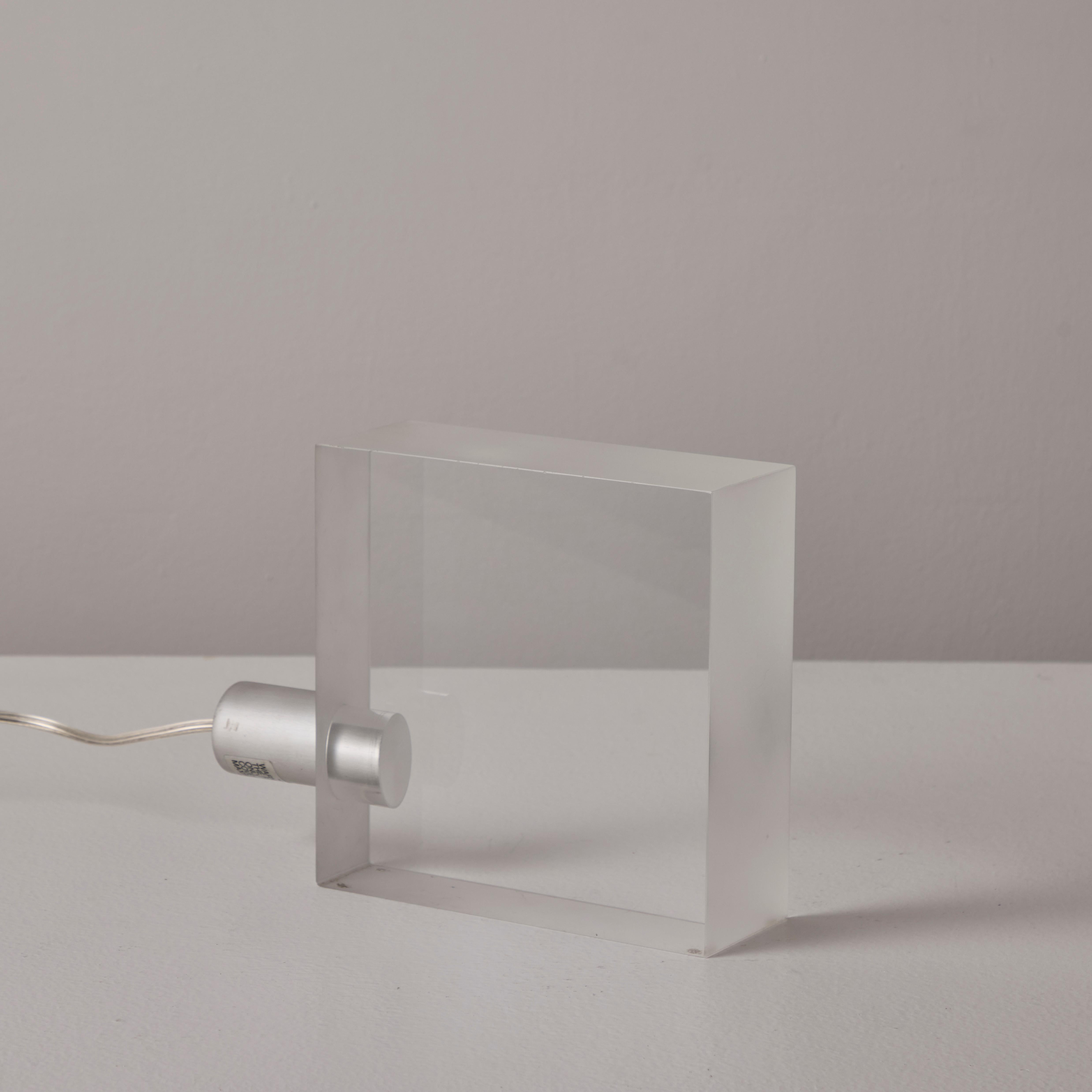Mini Tofu table light by Tokujin Yoshioka. Fixture is illuminated by the aluminium socket. Designed by architect Tokujin Yoshioka for Yamagiwa in Japan. The light was in limited production from 2000 and has been discontinued and is no longer
