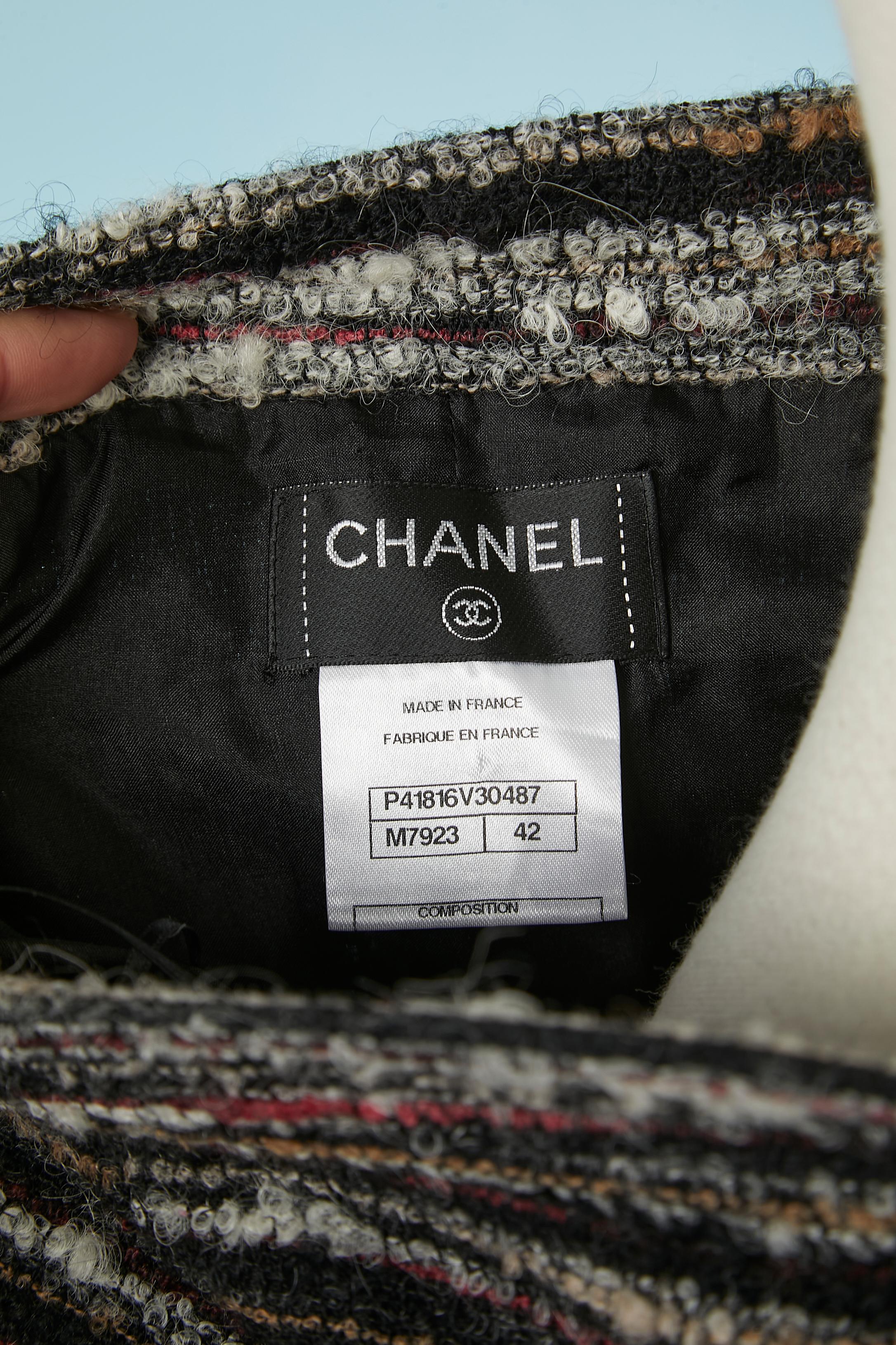 Women's Mini tweed skirt with branded buttons on the front Chanel  For Sale