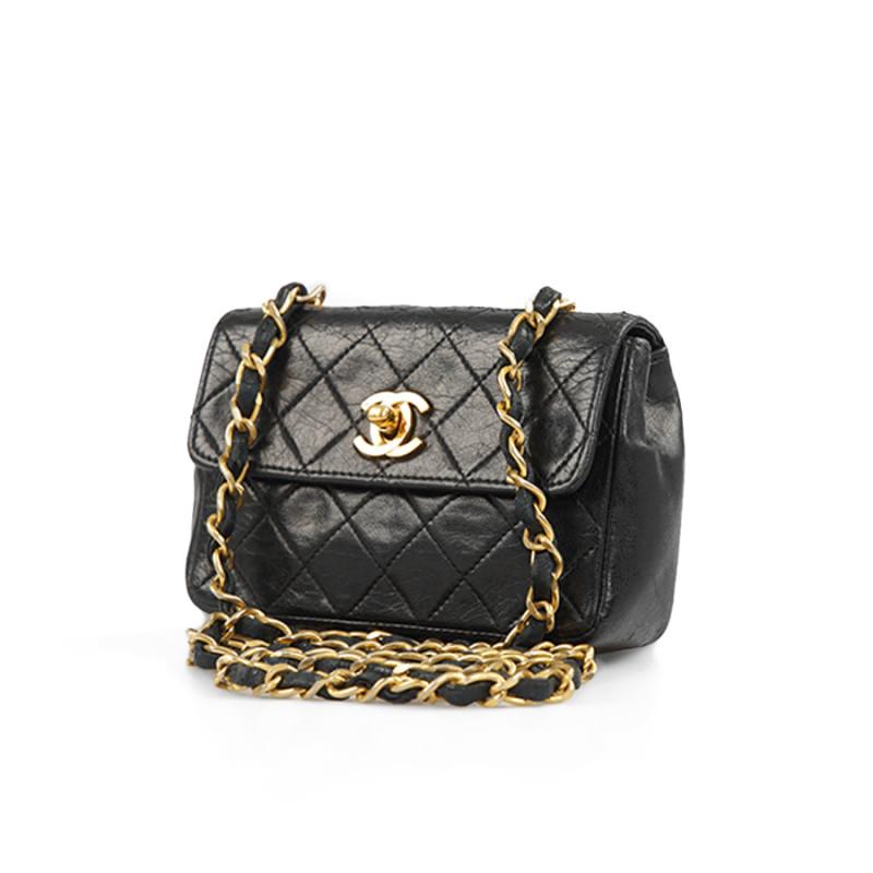 Cute vintage CHANEL black mini shoulder bag

Condition: very good for a vintage bag
Made in France
Collection : Timeless
Material : lamb leather
Interior : burgundy leather
Color : black
Dimensions: 14 x 10 x 4 cm
Shoulder strap: 110 cm
Hologram: