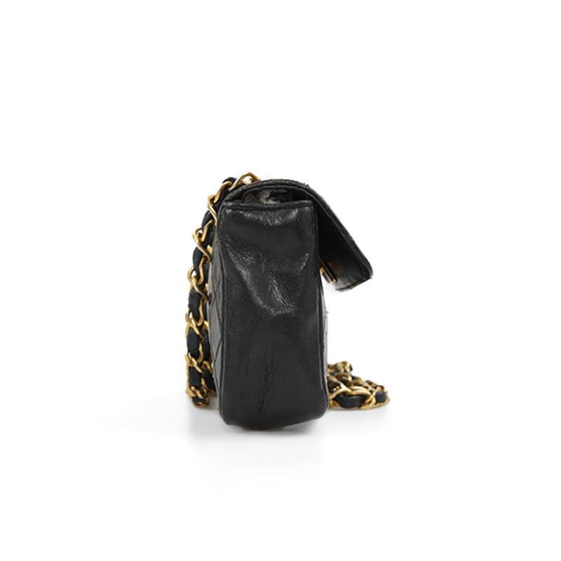 Women's or Men's Mini Vintage Timeless Chanel Leather Bag For Sale