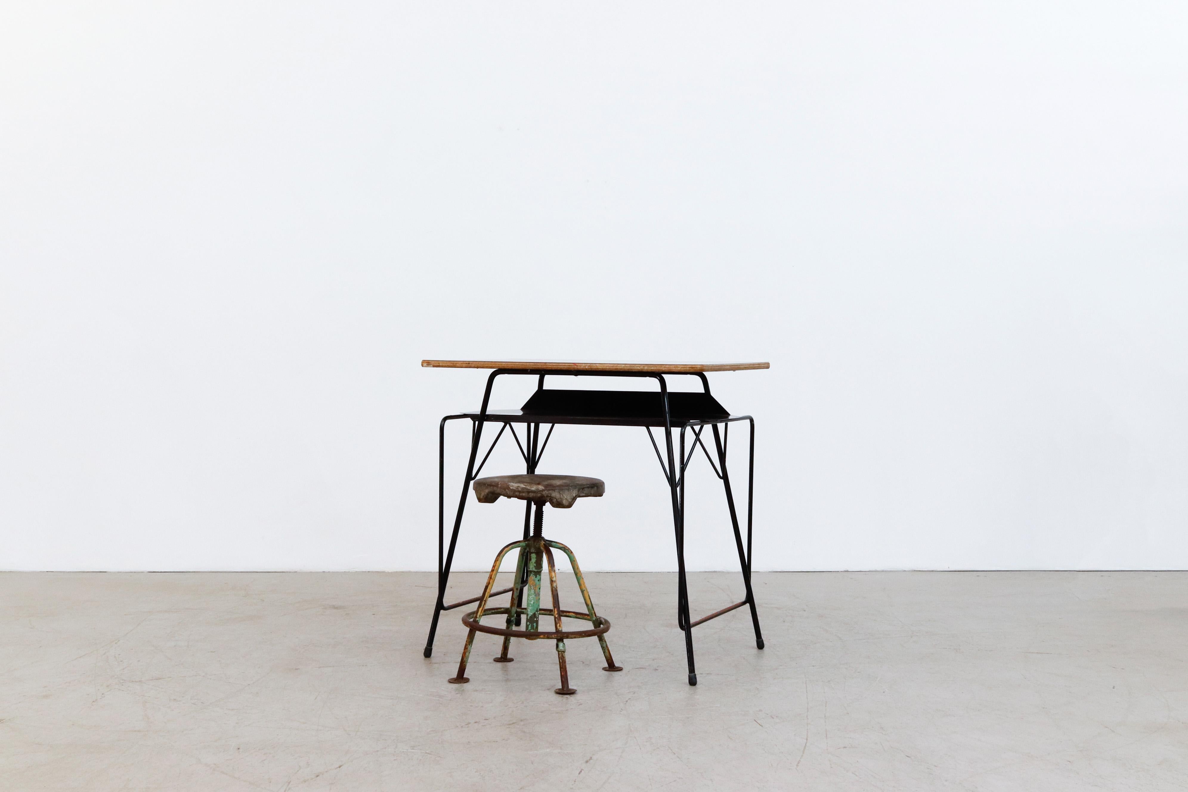 Mini Willy Van Der Meeren Industrial desks for Tubax. Printed formica top with solid black enameled metal frame in original condition with visible wear and scratching consistent with age and use. Priced individually. Shown with well worn vintage