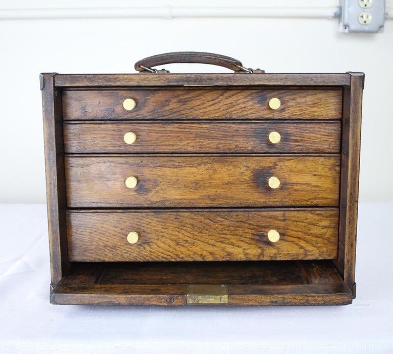 Miniature Antique English Oak Campaign Chest Of Drawers For Sale