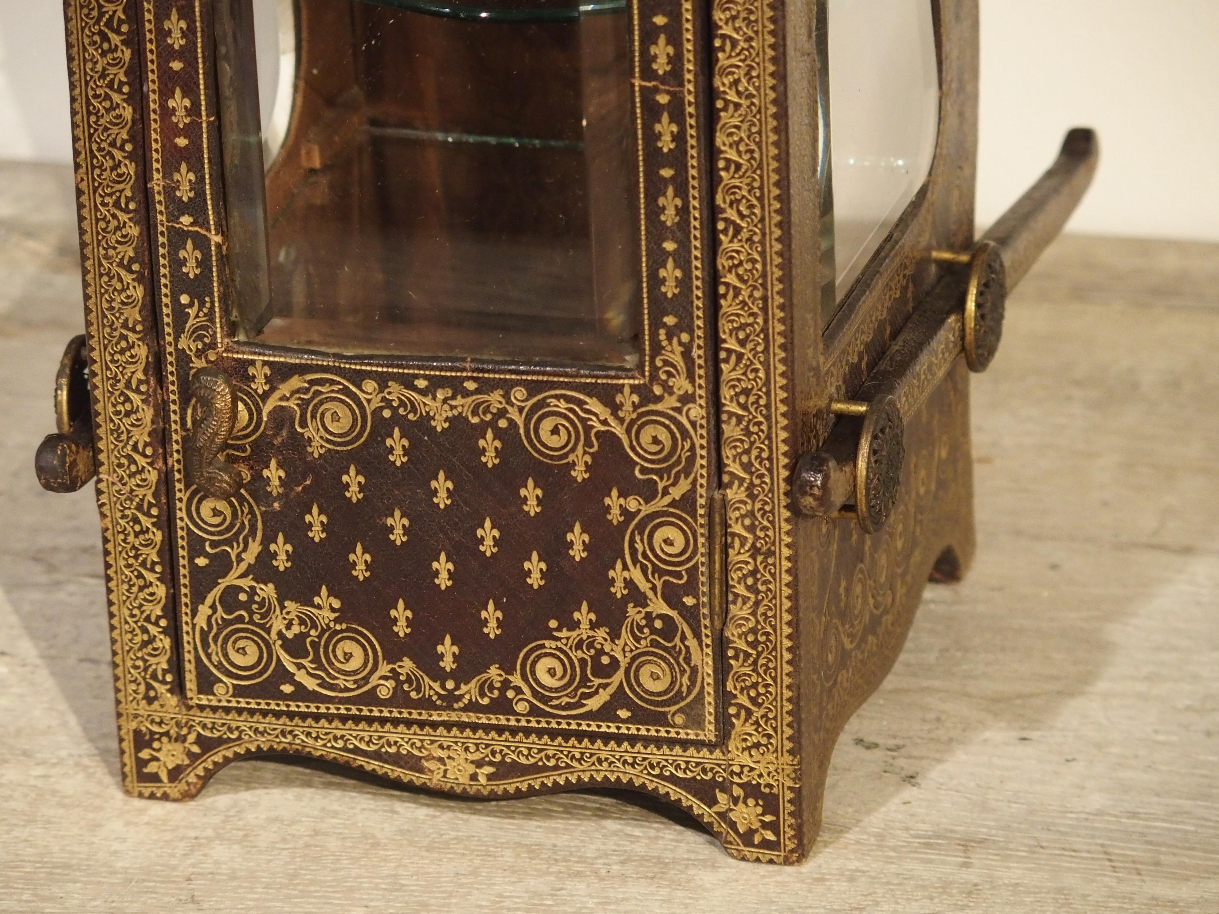 This Chaise a Porteur, or Sedan chair is a miniaturized version of full scale models typically used in the 16th-18th centuries. Urban homes and Chateaux of nobility often had these placed in entry halls of their beautiful homes. They were a way for