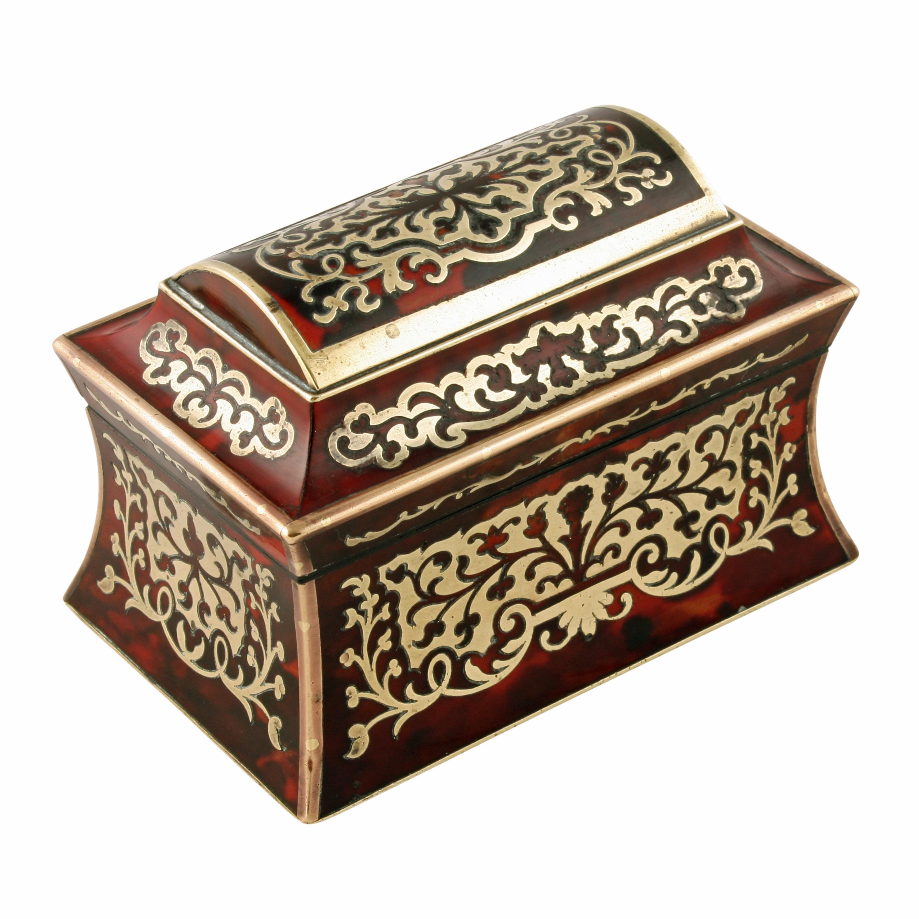 A 19th century miniature boulle work box in the shape of a sarcophagus tea caddy.

The wood box is beautifully decorated with boulle work (heavy brass inlaid into tortoise shell) with brass rims and base.

The hinged lid opens to a small storage
