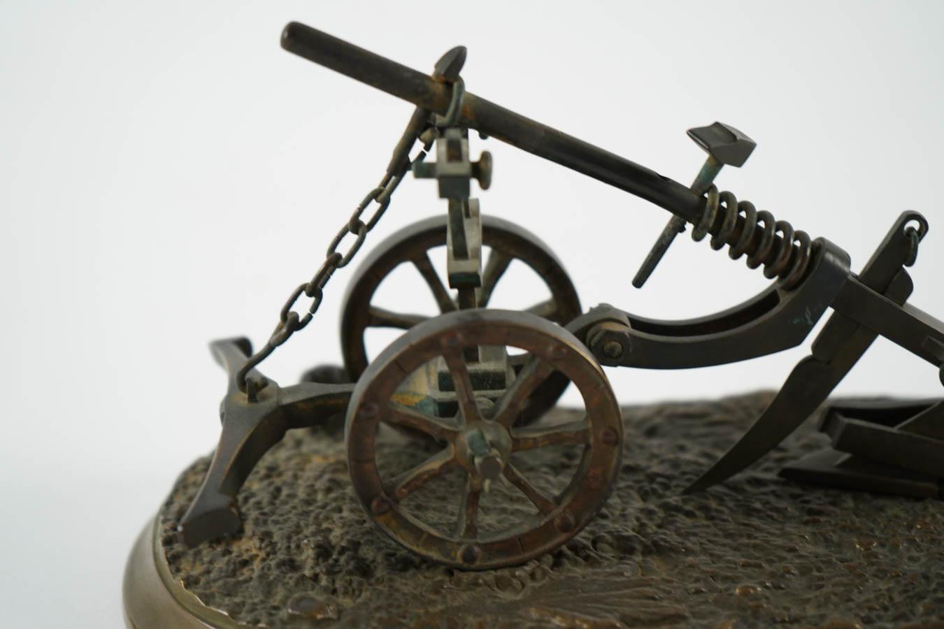 Miniature bronze plow, circa 1900
