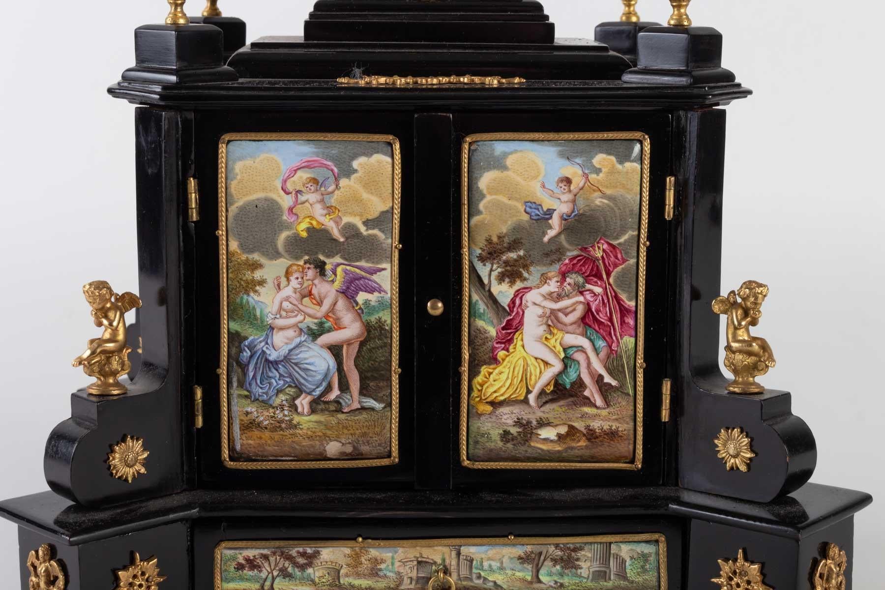 Miniature cabinet, Vienna, enamel and gilded bronze, enameled porcelain, 19th century, Napoleon III
Measures: H 26cm, W 24cm, D 14cm.