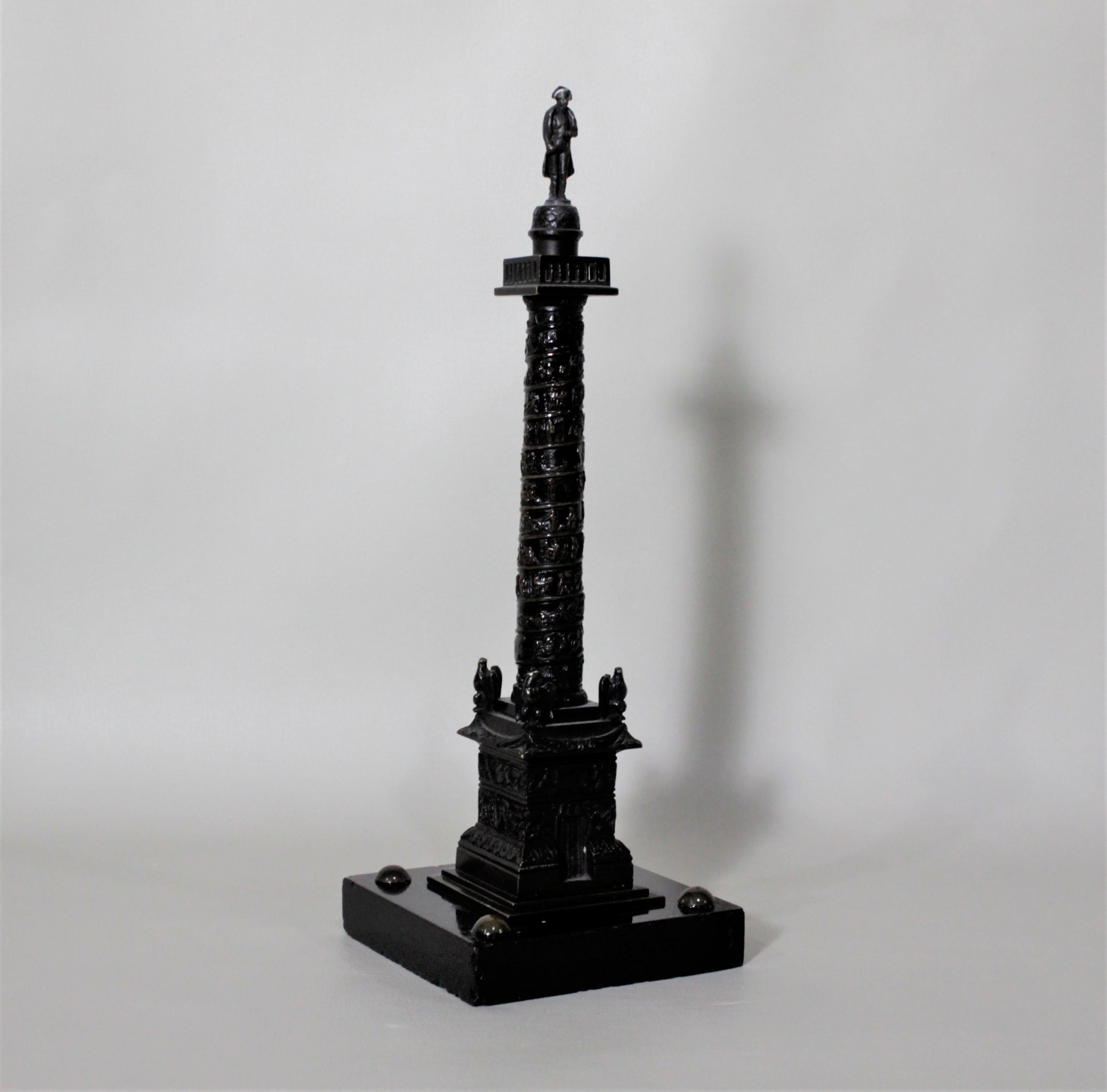 This miniature cast bronze architectural model of the Trajan Column dates to the 19th century to commemorate one of the Grand Tours of Europe. There is no foundry mark noted, but this bronze is presumed to have been cast in France. The bronze is