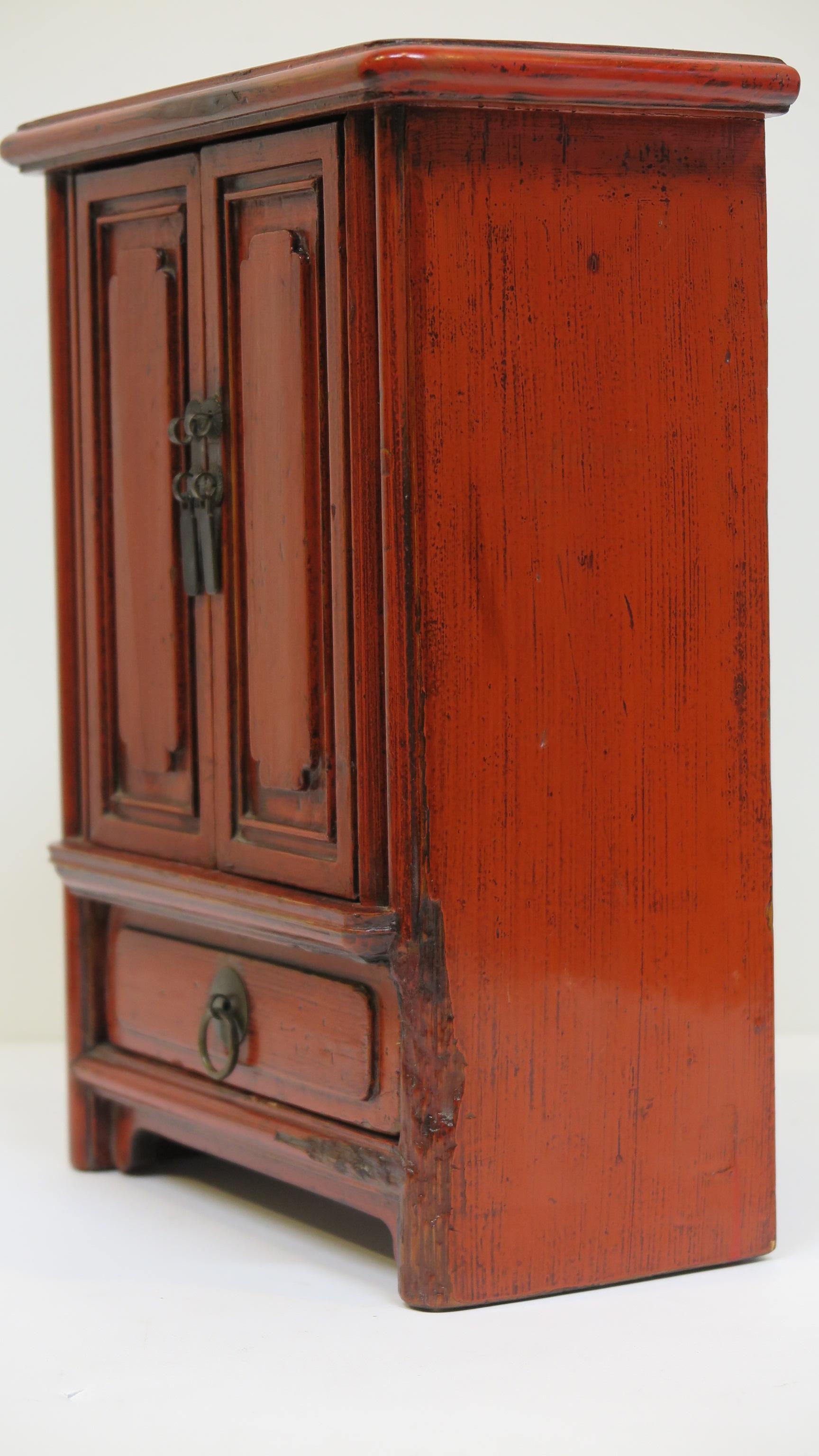 Early 20th Century Miniature Chinese Red Cabinet