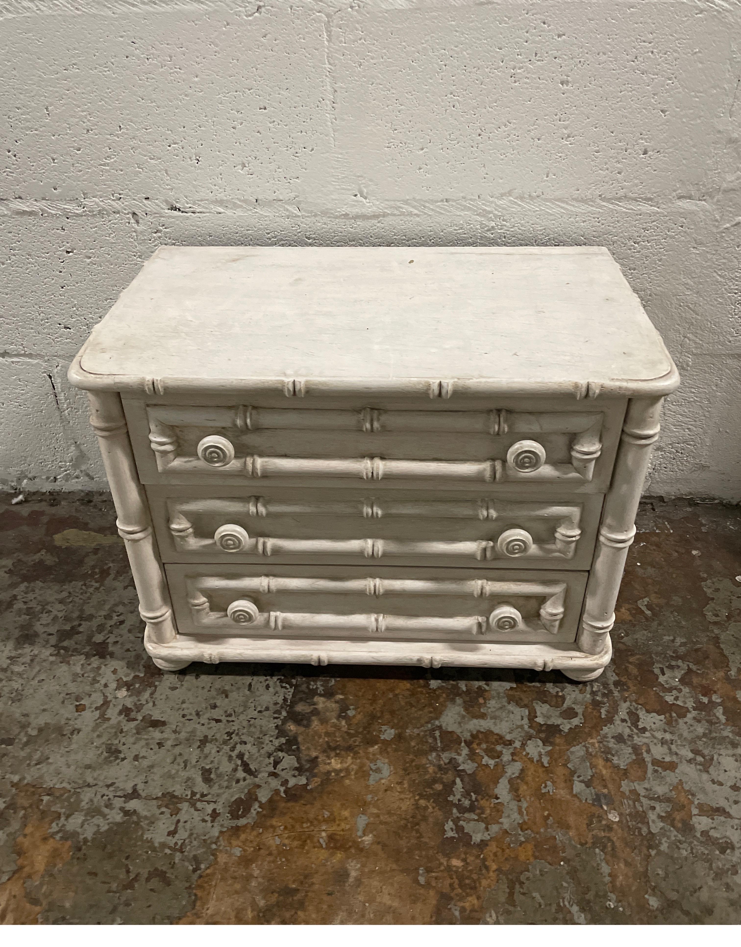 Faux bamboo miniature painted three drawer chest.