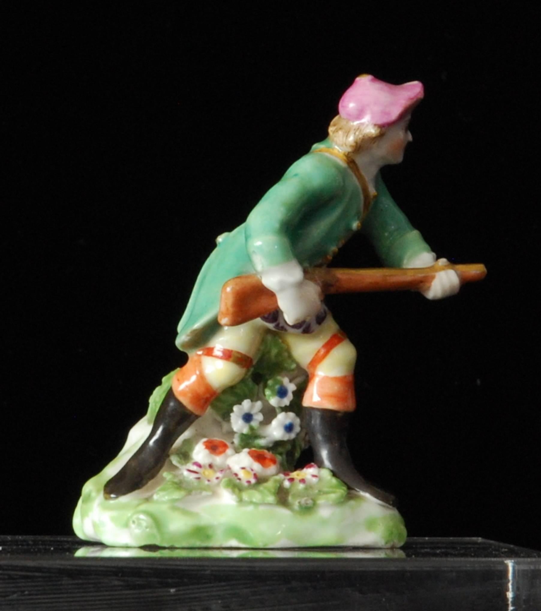 An extremely rare figure of a huntsman with his rifle, stalking through the flowery undergrowth. A lively, beautifully modelled figure, with an interesting fake Chelsea mark.

Prov: Mrs Paul Mellon
  