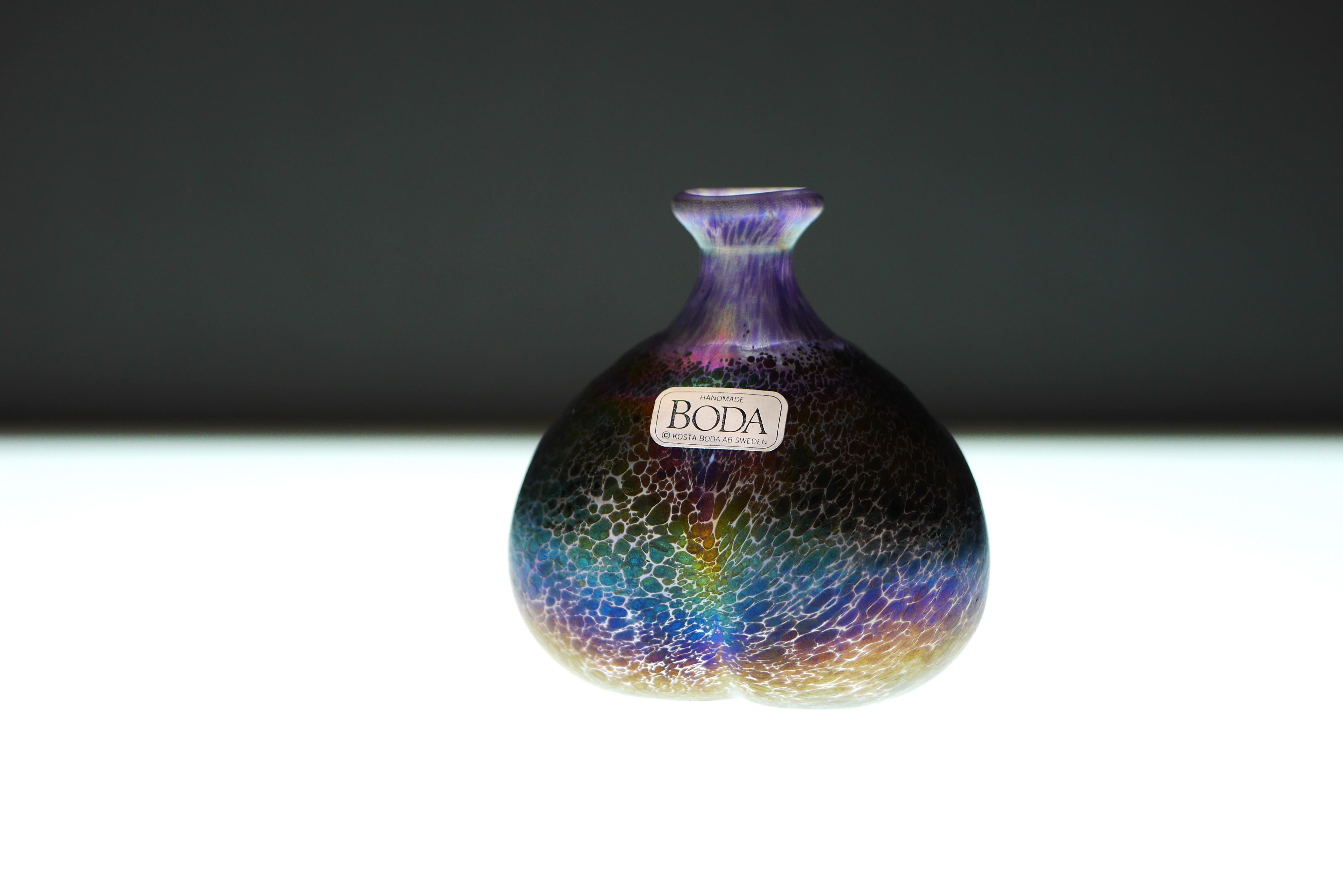 
A small but stunning vintage miniature glass vase handmade and signed by Bertil Vallien for Kosta Boda, Sweden. It is a part of his selected 