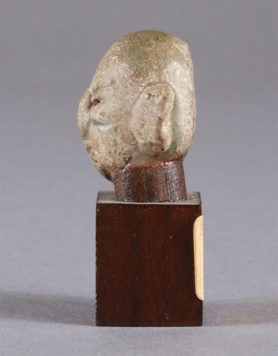Miniature Head Made of Ceramics on Wooden Base, Cambodia, 20th Century For Sale 2