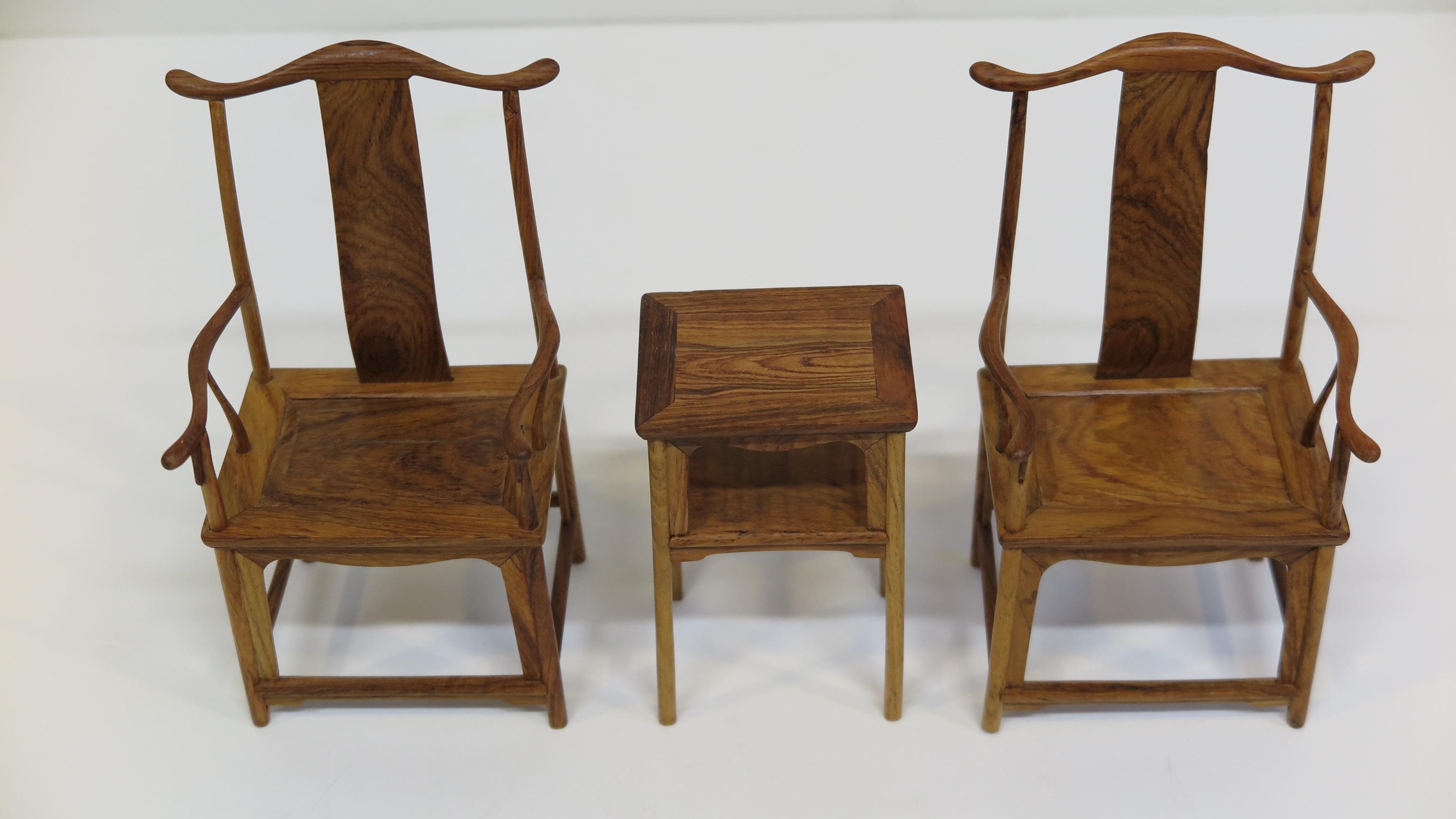 Miniature Huanghuali Chinese official's hat chair set with table. An expertly crafted miniature architectural model in Huanhuali wood of 
