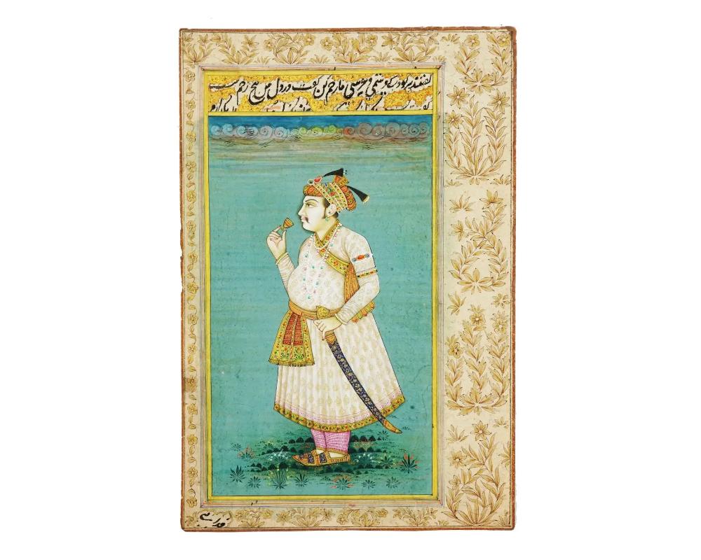 A miniature Indo Persian Mughal Art watercolor painting on antique manuscript leaf depicting a portrait of a Royal person, probably Dawar Bakhsh, facing to the left, in the foreground the figure stands on a green ground on which grow