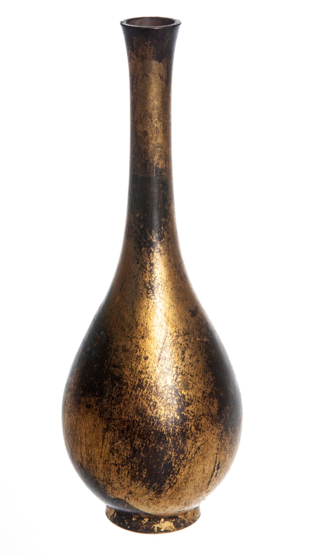 Classic Japanese bud vase with one of a kind aged gold leaf over bronze finish. Mottling is created with chemicals & heat.