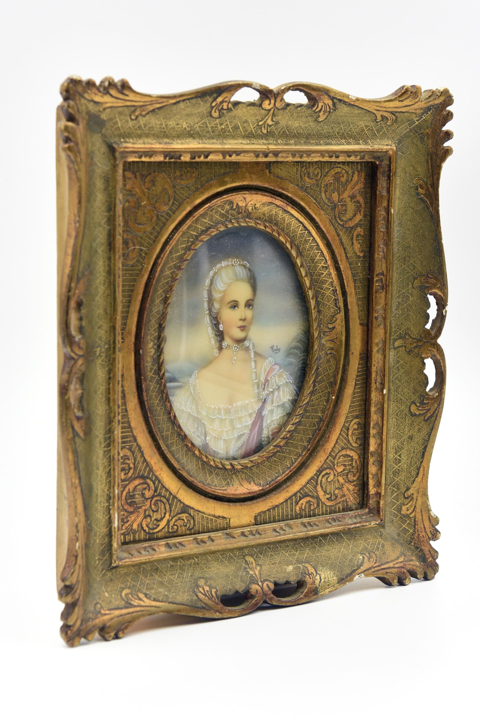 Beautiful hand painted jeweled lady oval portrait under glass. The giltwood frame is decorated with a scroll design. The painting is signed 