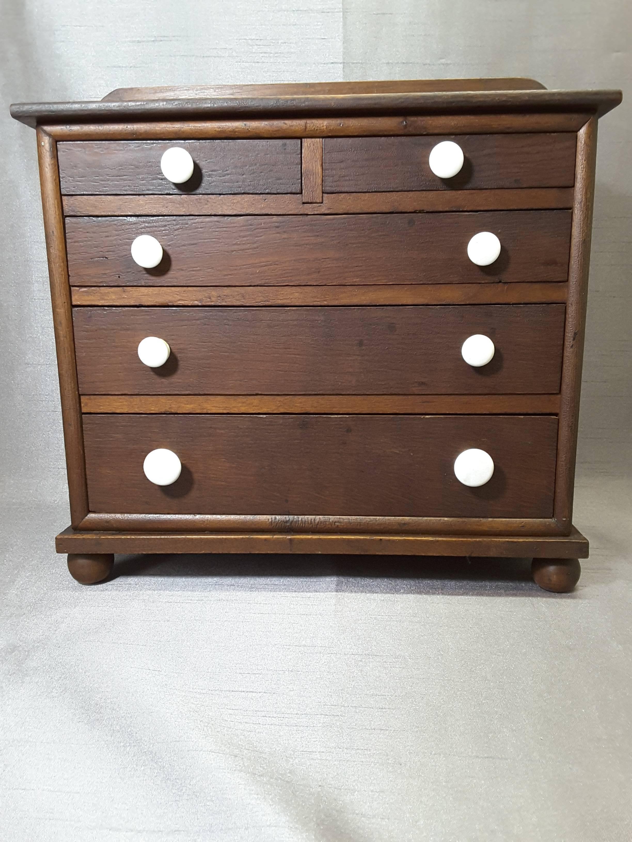bonnet chest of drawers