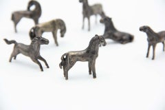 Miniature of seven horses in silver