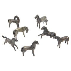 Miniature of seven horses in silver