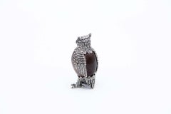 Miniature owl in silver wrapped in hard stone