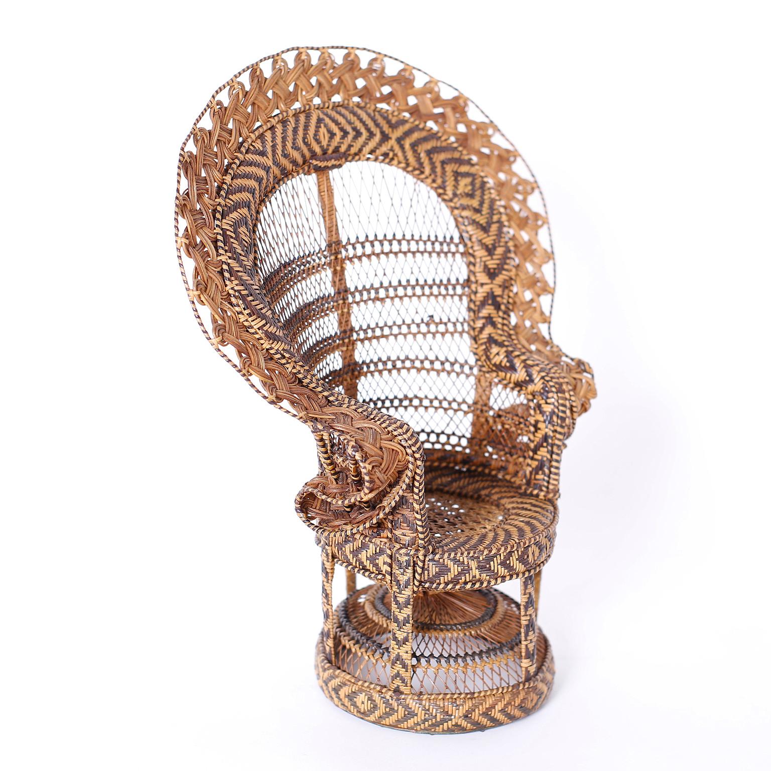 Miniature Anglo Indian peacock chair or salesman sample crafted with amazing detail in wicker and reed, true to the iconic design. Best of the genre.