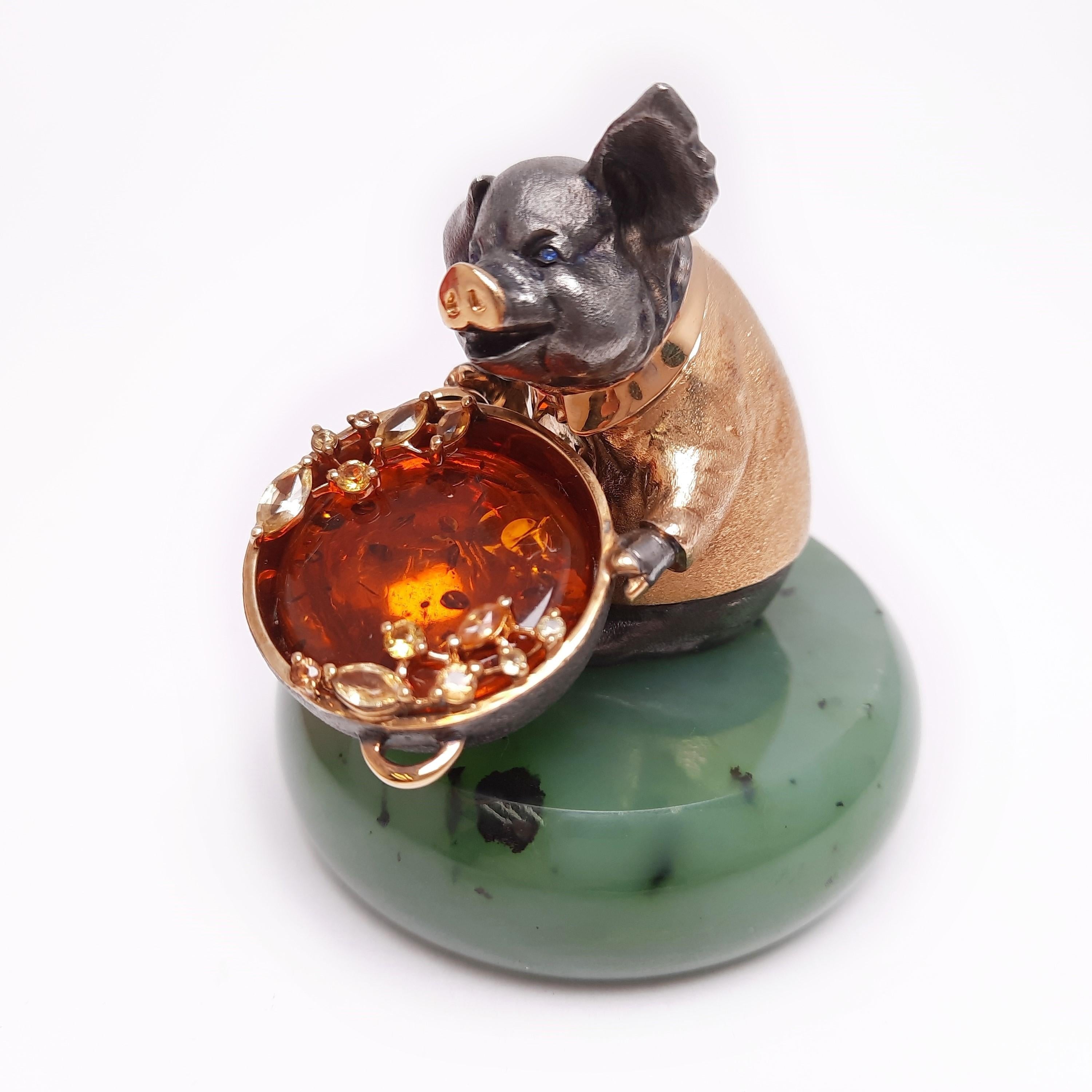 A pig, a symbol of fertility and abundance, was made into a silver miniature with a creative idea and masterful craftsmanship. A genuine silver pig has lively facial features with sapphire eyes and cooks a hotpot for family and friends. Inside the