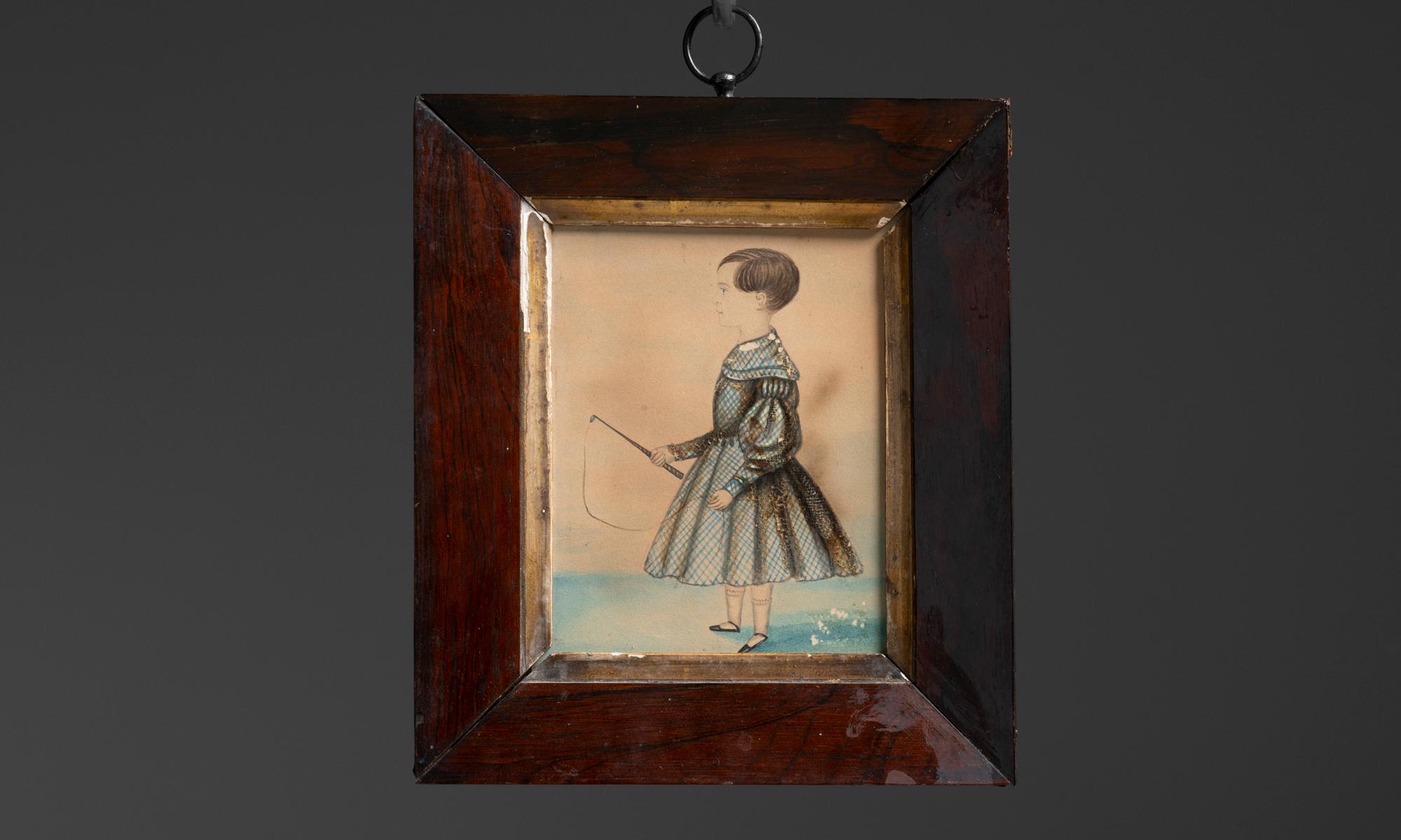 Miniature Portrait of Child
England circa 1830
Painting of a child in a blue dress holding a whip.
7”w x 1”d x 8”h