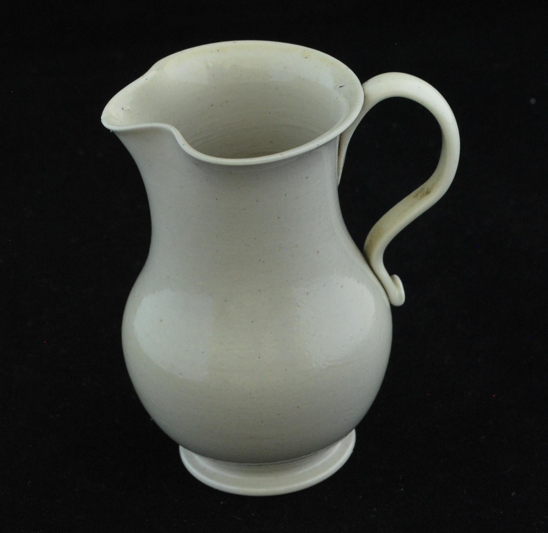 A charming, small jug in salt-glazed earthenware. Plain: just the way we like it.
 