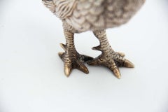 Miniature silver rooster with low reliefs