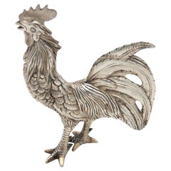 Miniature silver rooster with low reliefs
