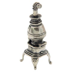 Miniature silver salamander with four support legs