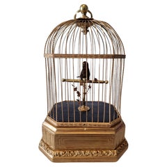 Vintage Miniature Singing bird in cage by Karl Griesbaum