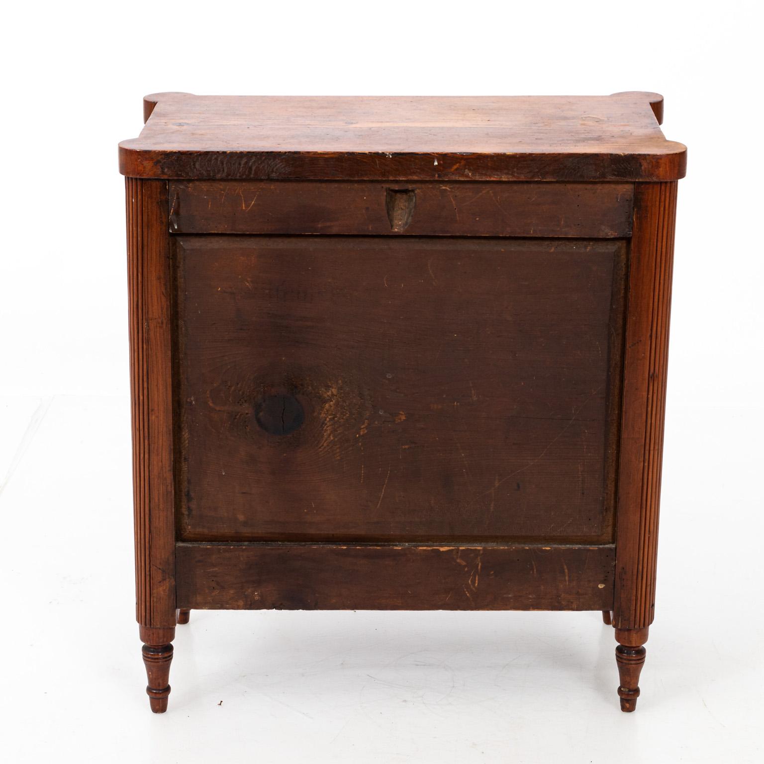 French late 19th century salesman sample sized chest of drawers in fruitwood with brass hardware. Please note of this is miniature and not a full sized piece. Wear consistent with age.