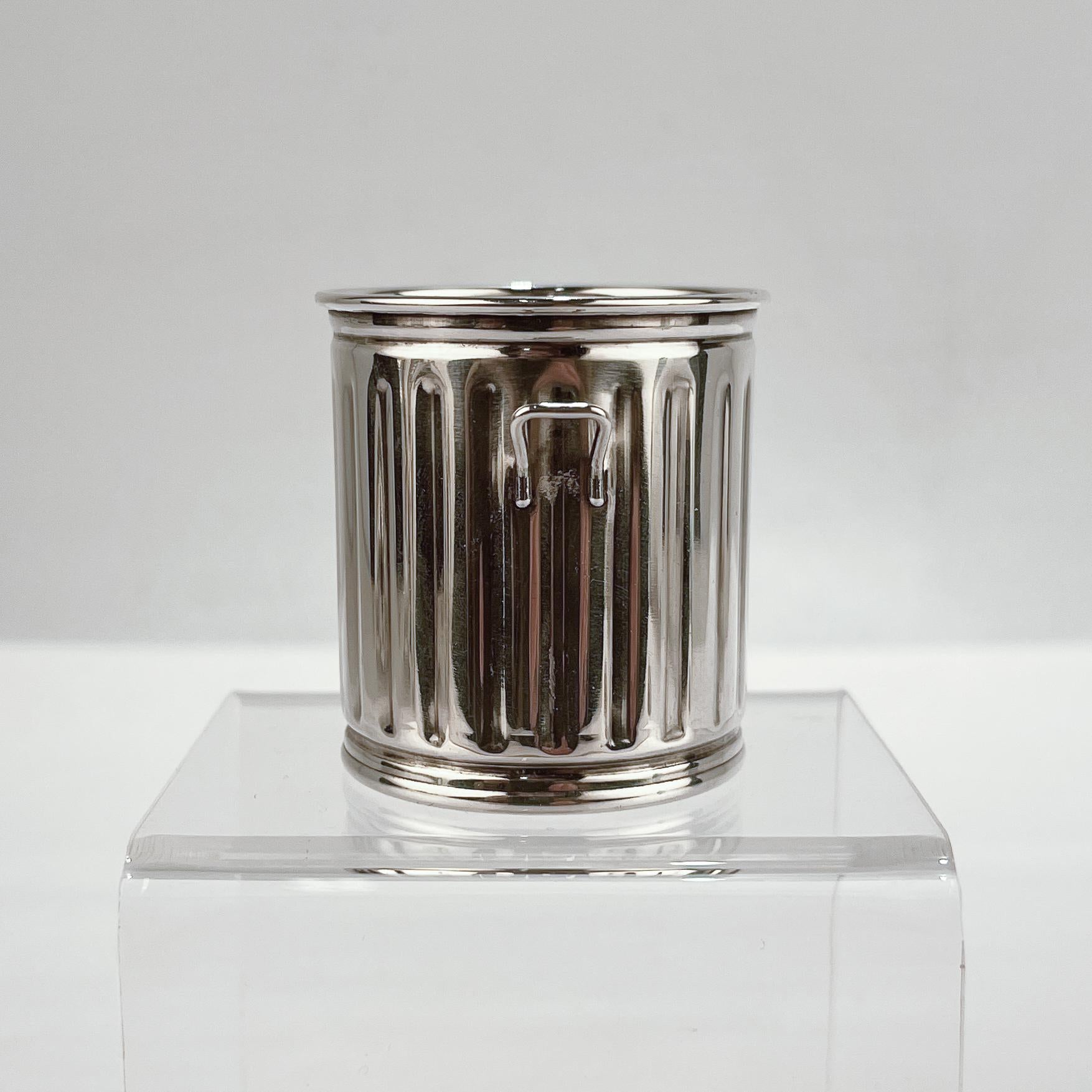 silver waste basket