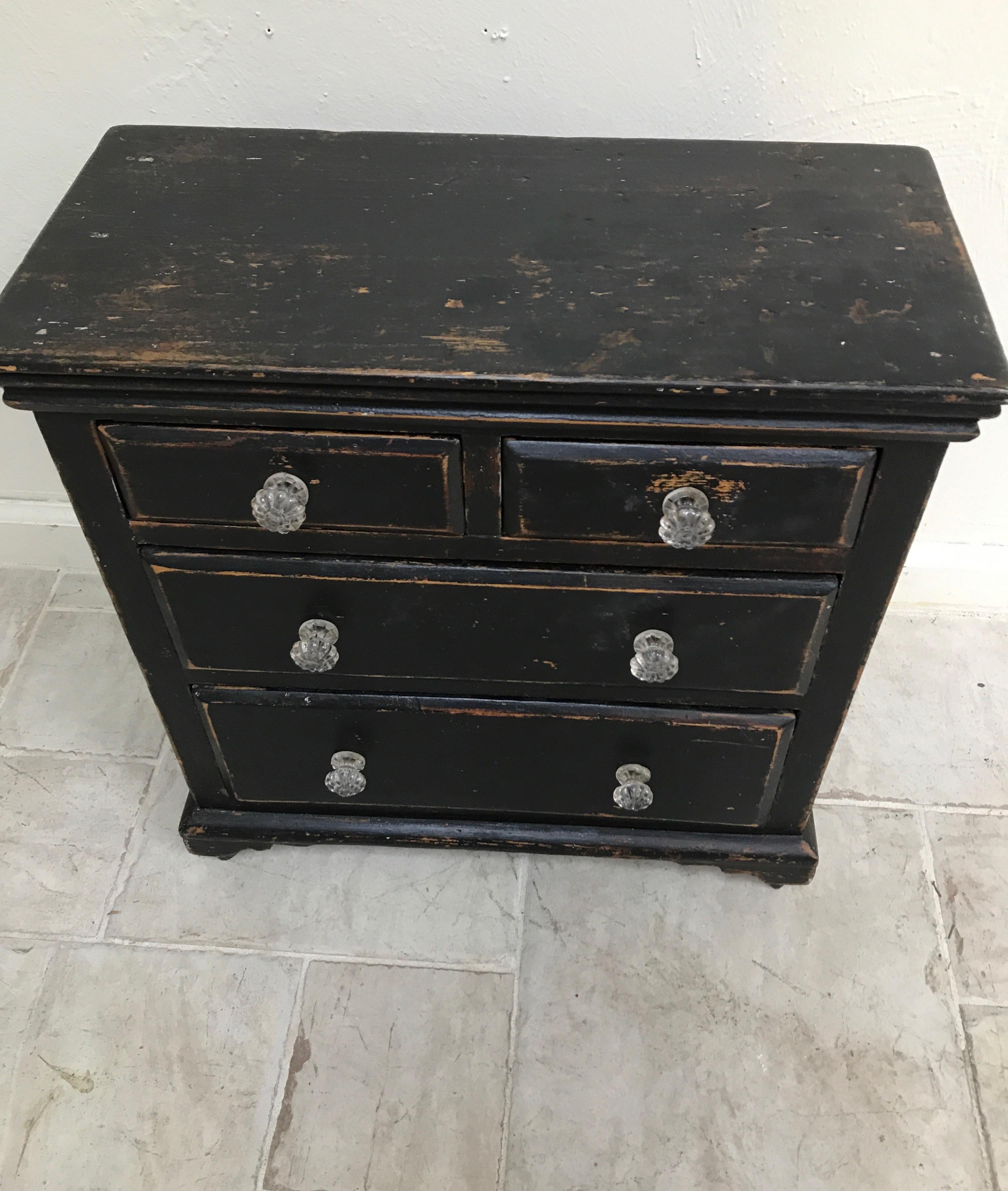 Miniature four-drawer Swedish chest with original paint and glass knobs.