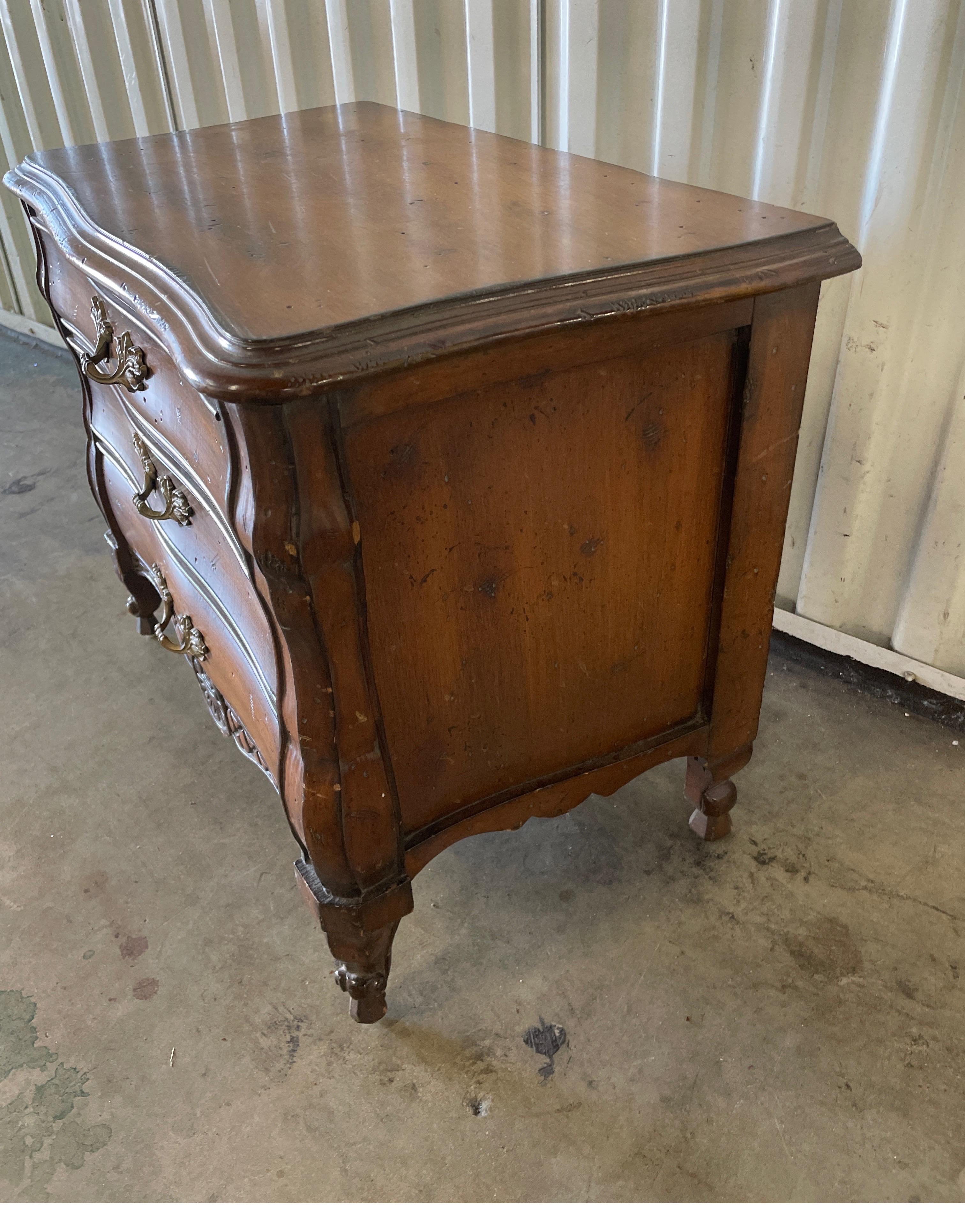 Charming three drawer miniature Louis XV style chest of drawers.  Place next to a chair as a book rest or drinks table. Would also make a nice jewelry chest.