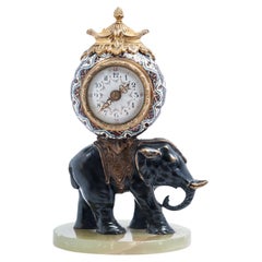 Antique Miniature time piece pendulum of a bronze elephant 