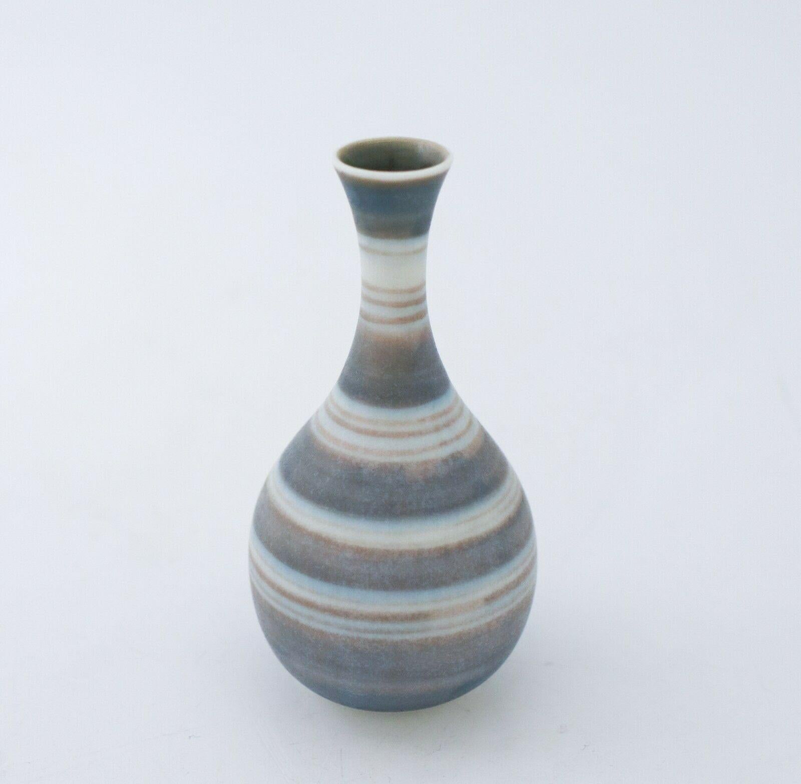 A miniature vase designed by Gunnar Nylund at Rörstrand. It is 9.5 cm high and in very good condition, it is marked as 1st quality. 

