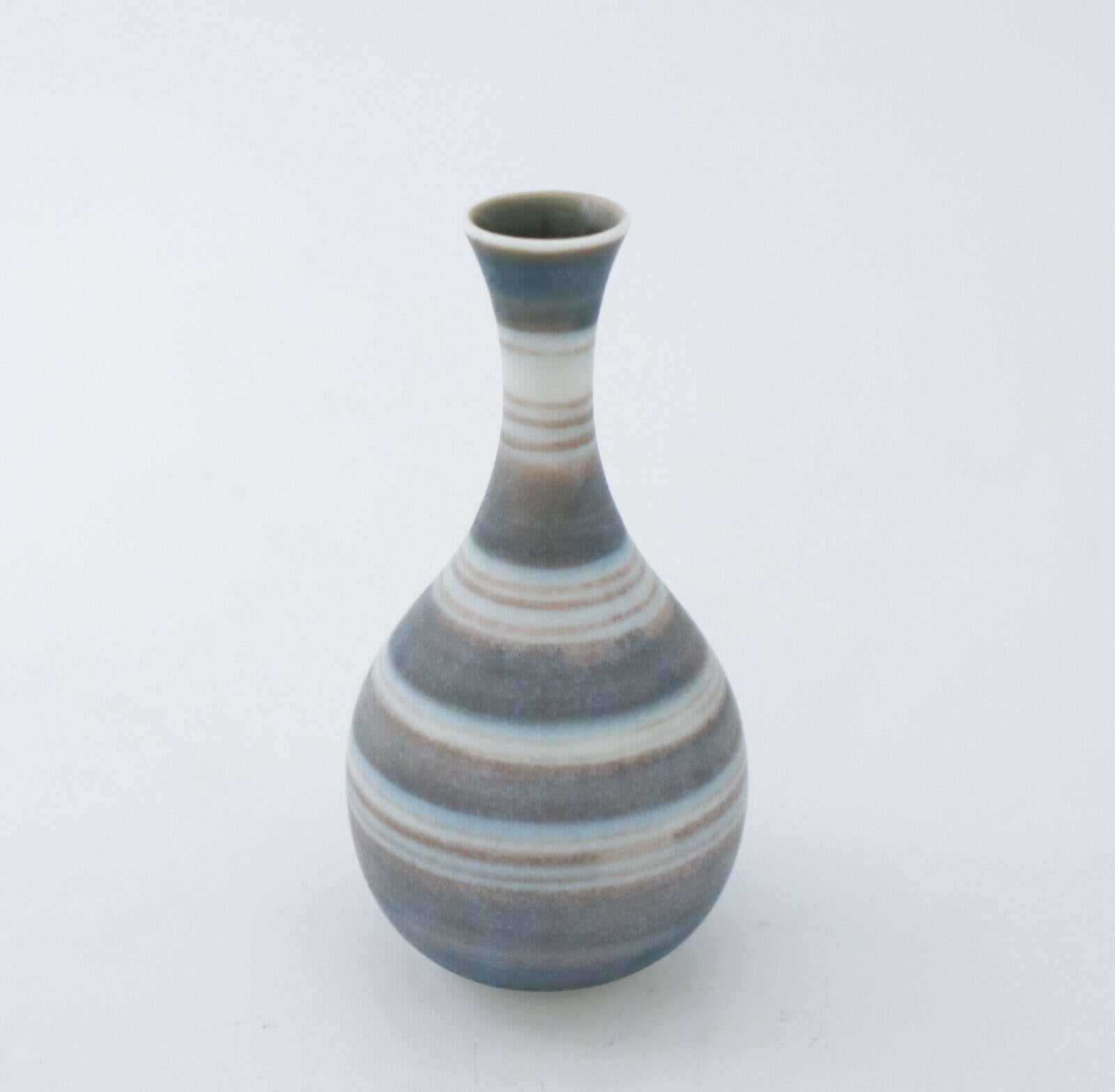 A miniature vase designed by Gunnar Nylund at Rörstrand. It is 9.5 cm high and in very good condition, it is marked as 1st quality. 

